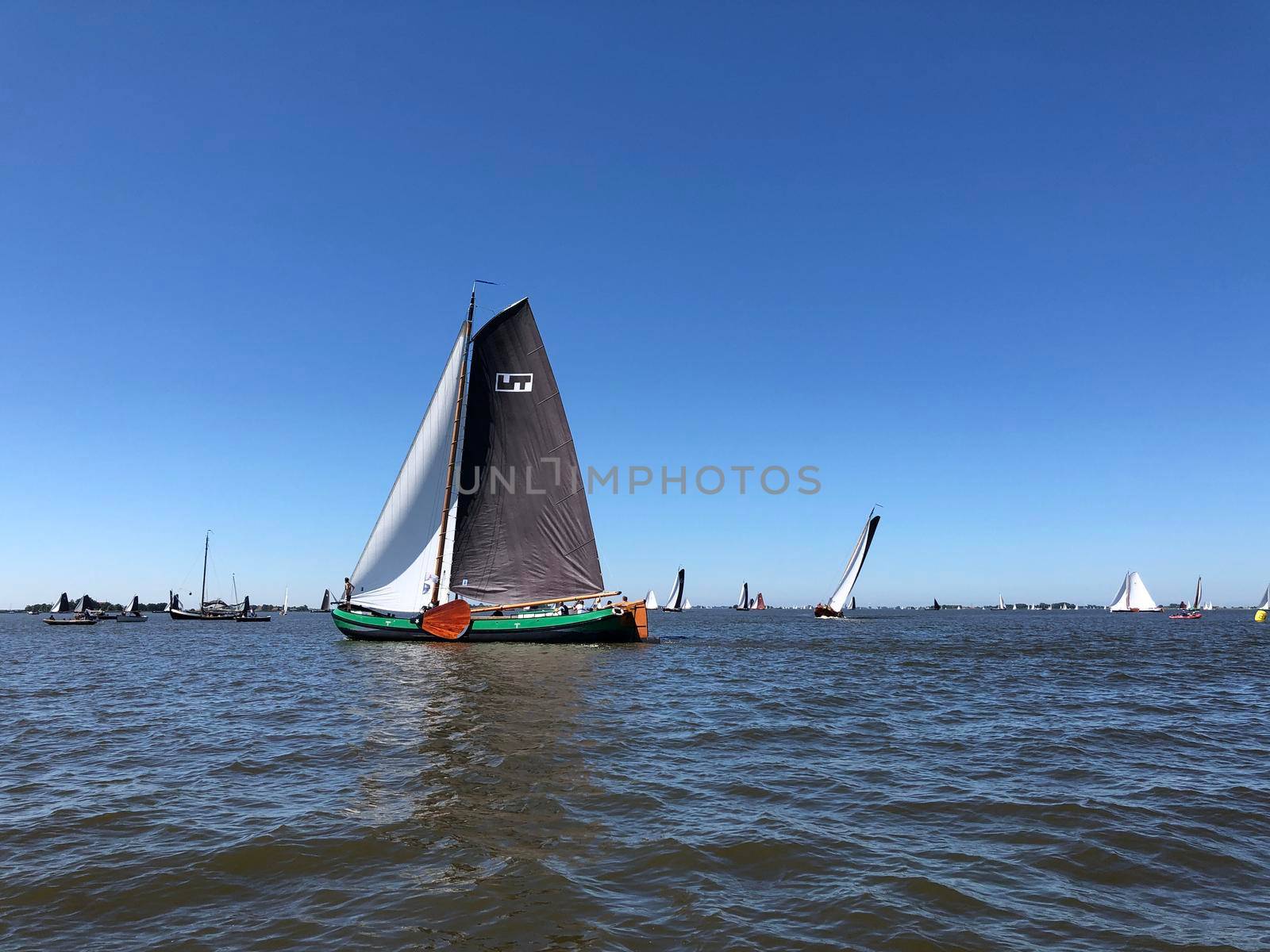 Sailing on a lake in Friesland The Netherlands