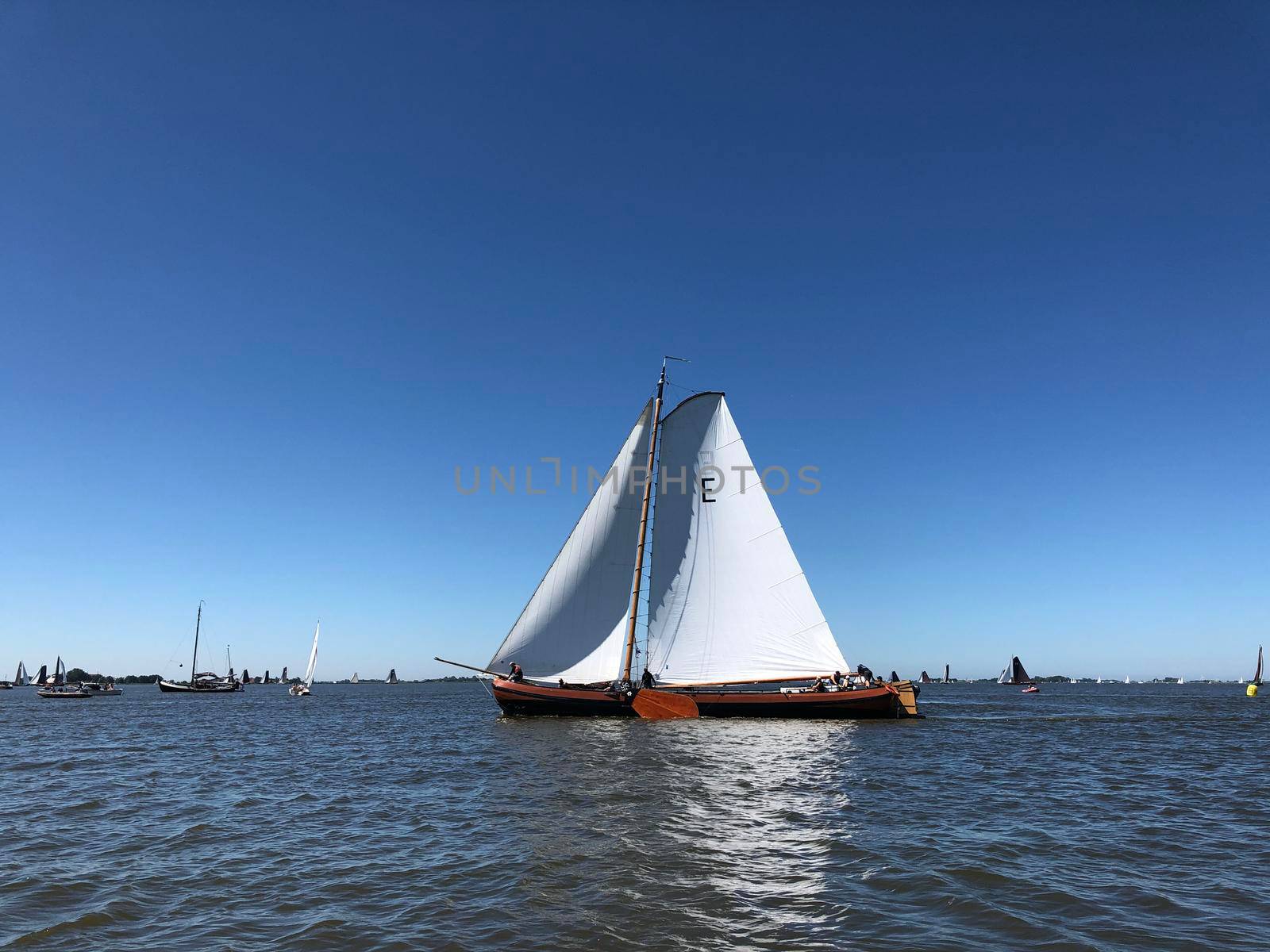 Sailing on a lake in Friesland The Netherlands