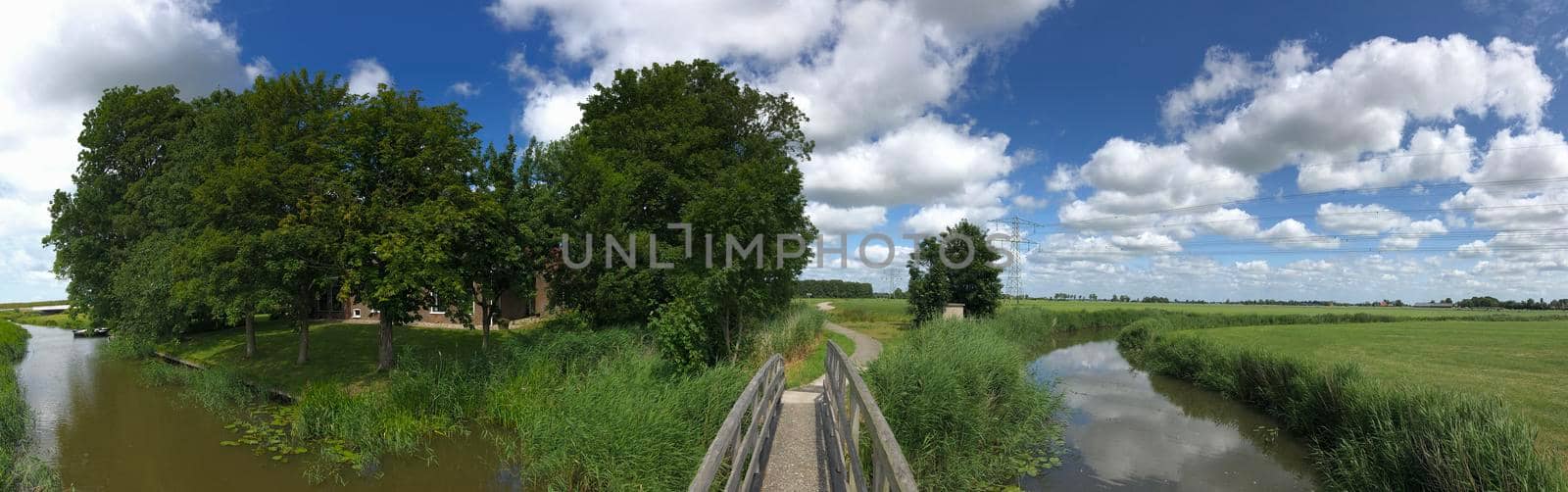 Bridge over a canal around Wirdum in Friesland The Netherlands