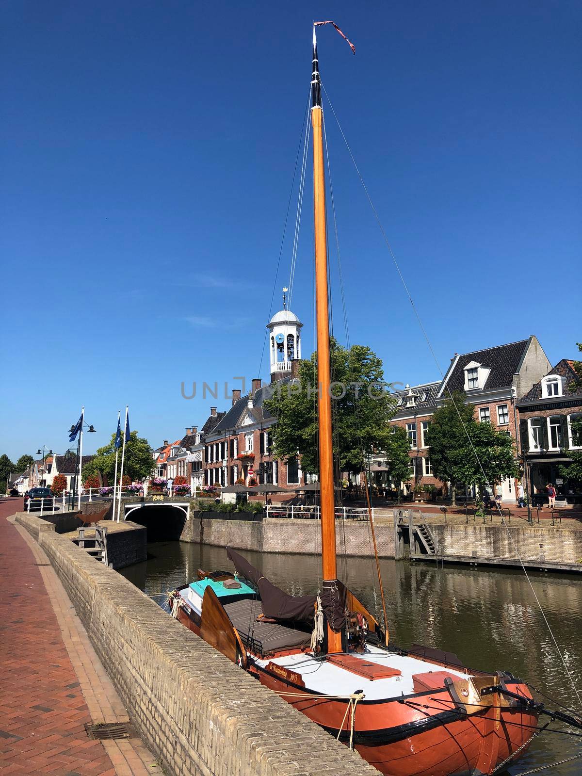 Skutsje at Het Grootdiep canal in Dokkum, Friesland The Netherlands