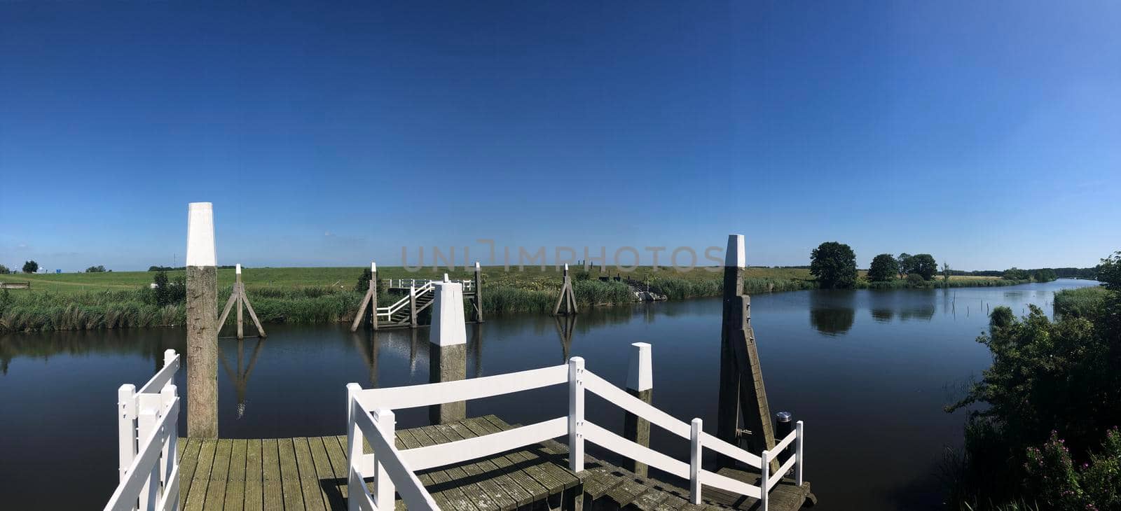 Panorama from the canal around the sea lock in Dokkumer Nije Silen, Friesland The Netherlands