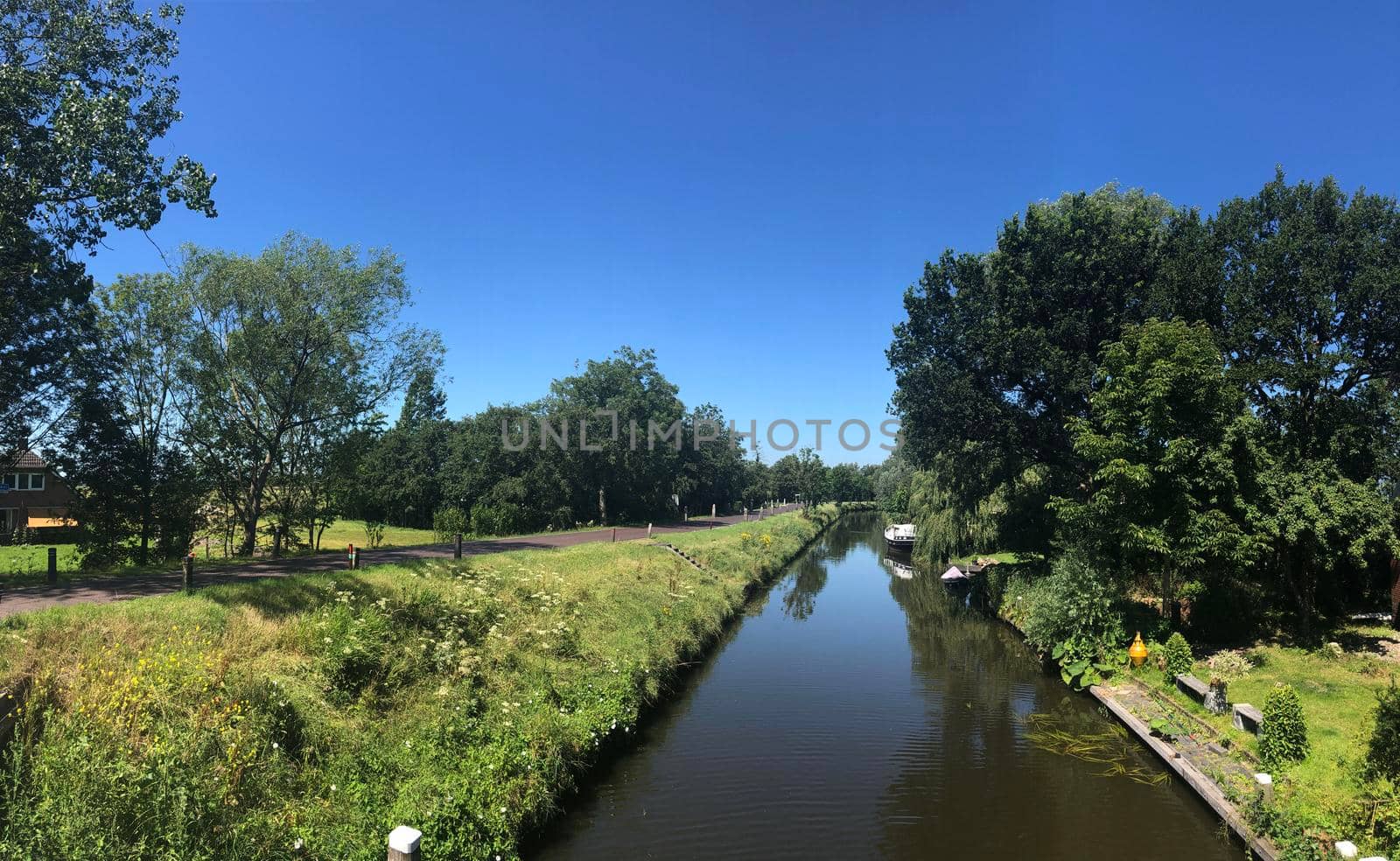 Canal in Westergeest, Friesland, The Netherlands