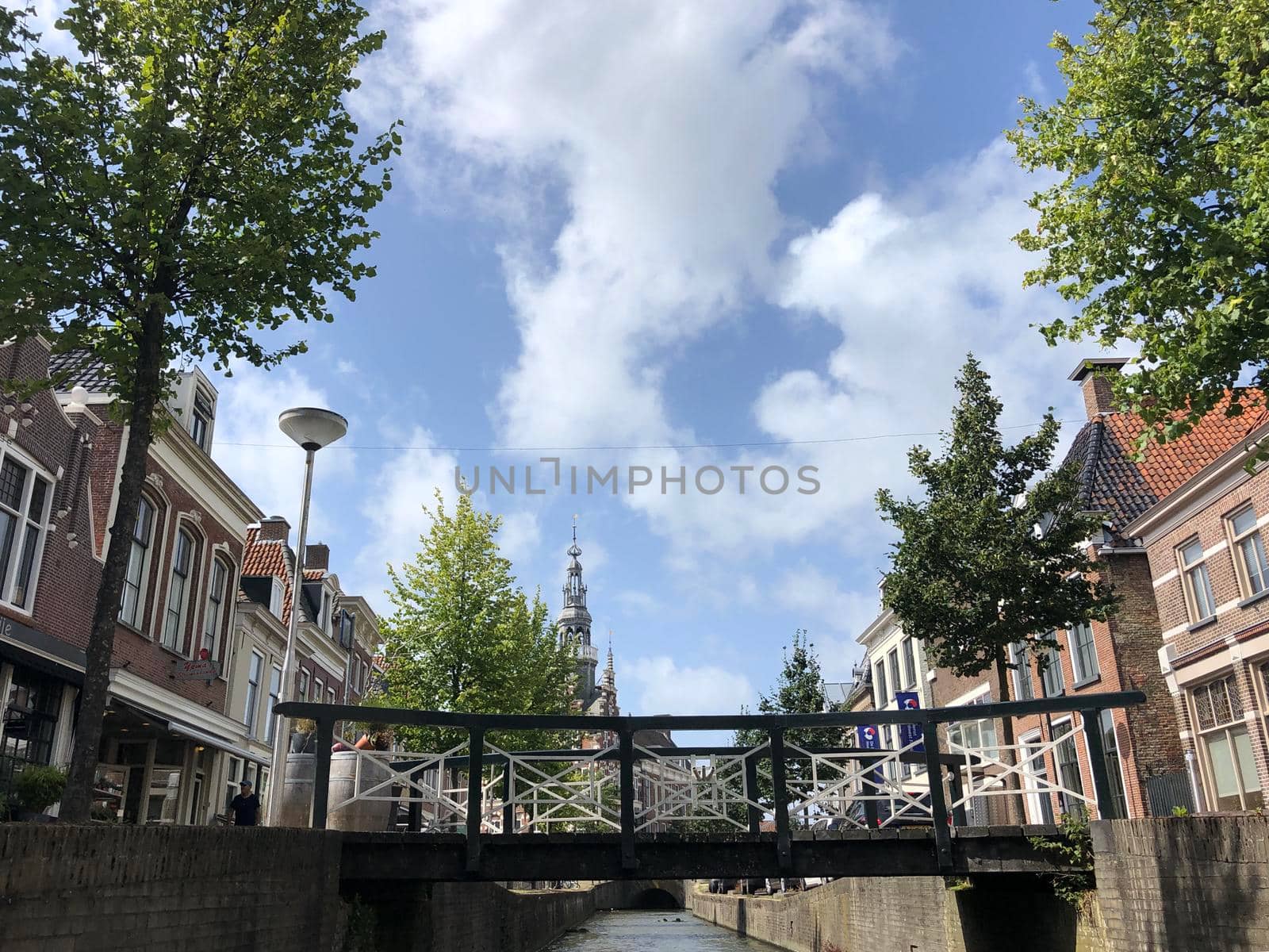 Canal with the city hall of Franeker, Friesland The Netherlands