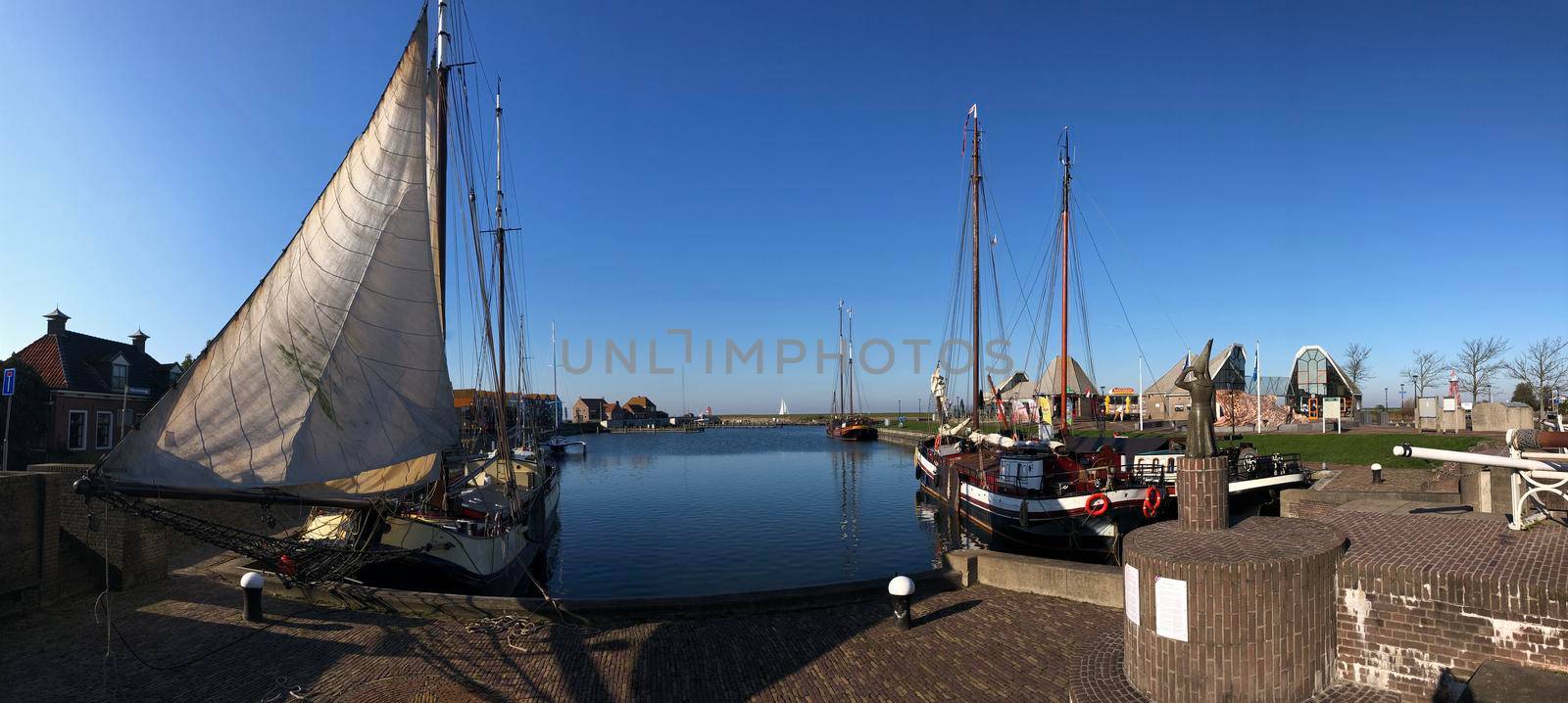 Panorama from the harbor of Stavoren by traveltelly