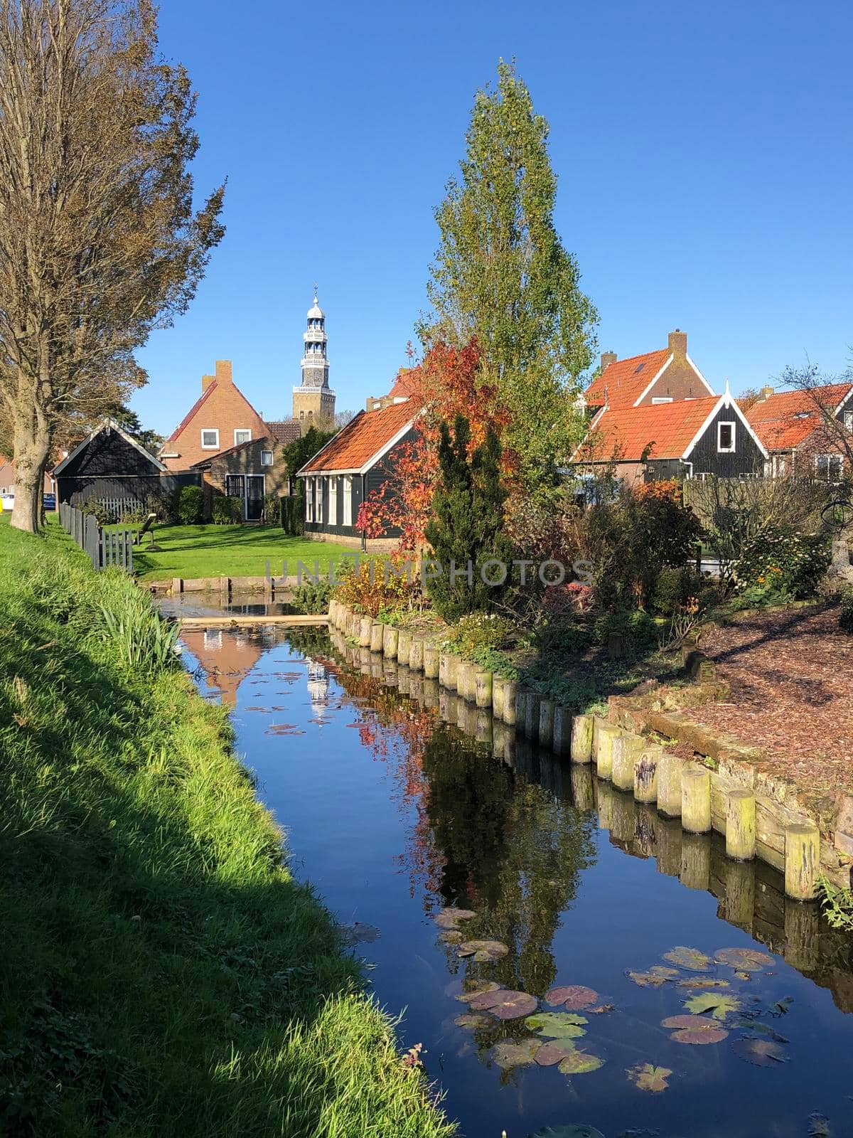 Canal in Hindeloopen during autumn in Friesland, The Netherlands