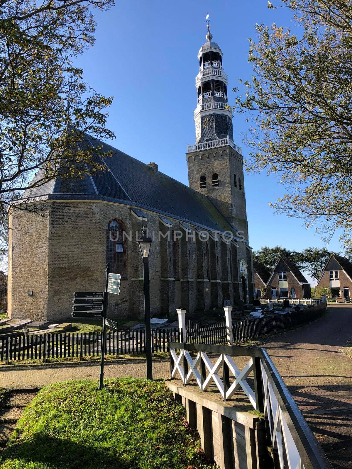 Church in Dyke Hindeloopen during autumn in Friesland, The Netherlands