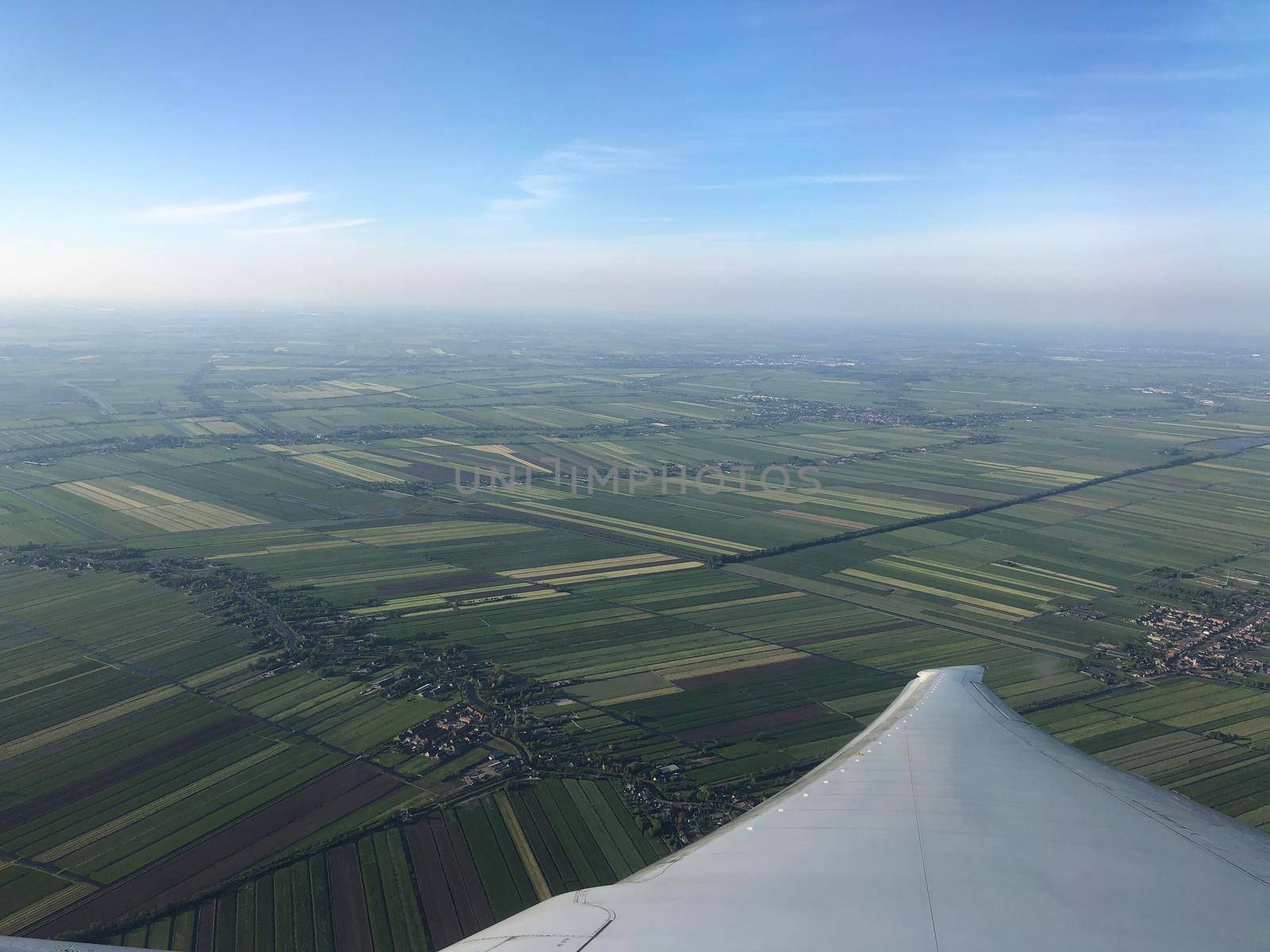 Flying above The Netherlands by traveltelly