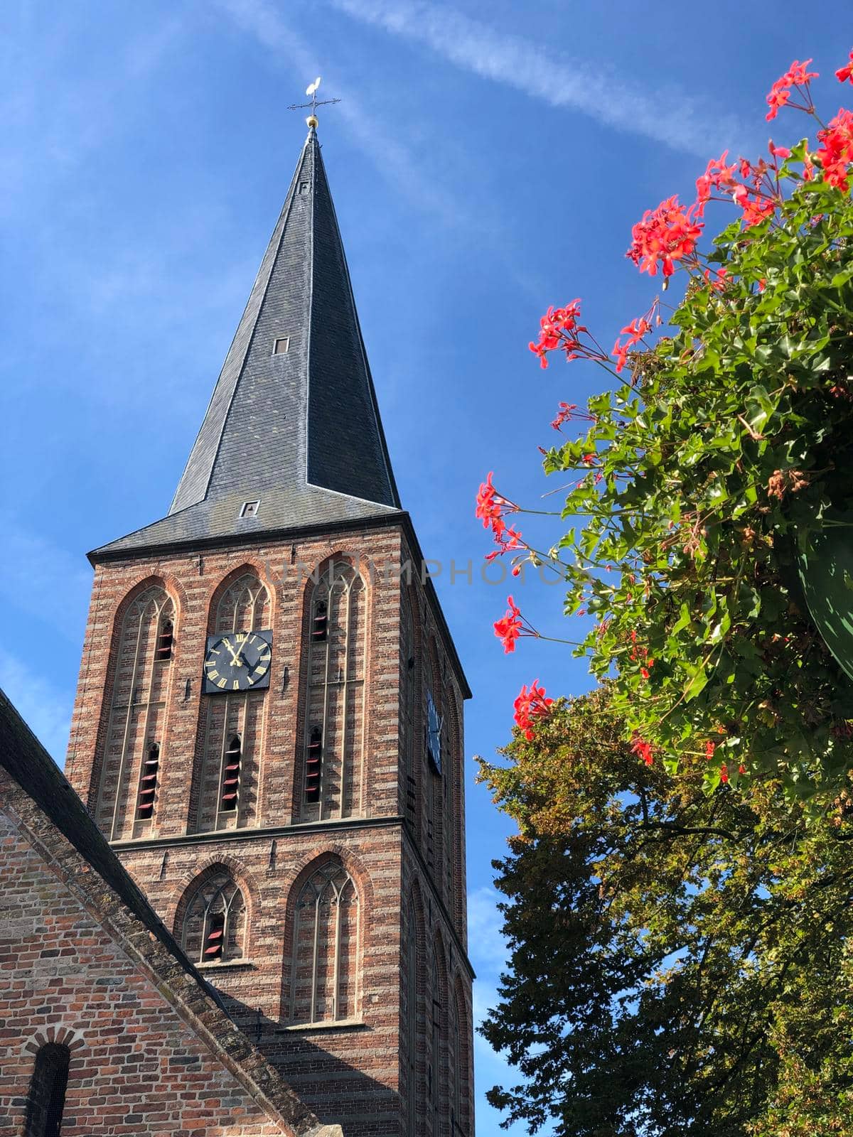 Remigius church in Hengelo Gelderland by traveltelly