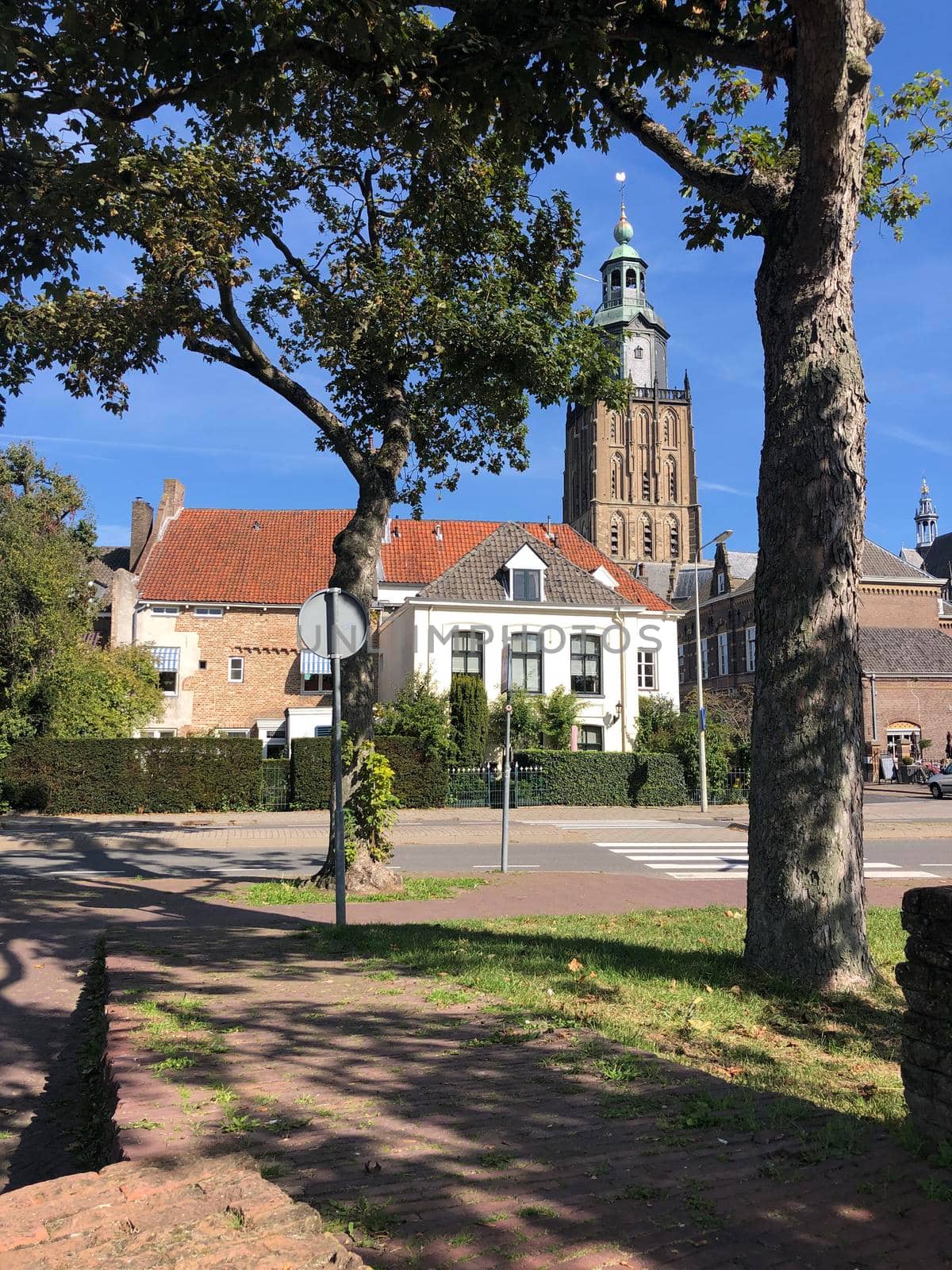 The old town with the St. Walburgis Church in Zutphen by traveltelly