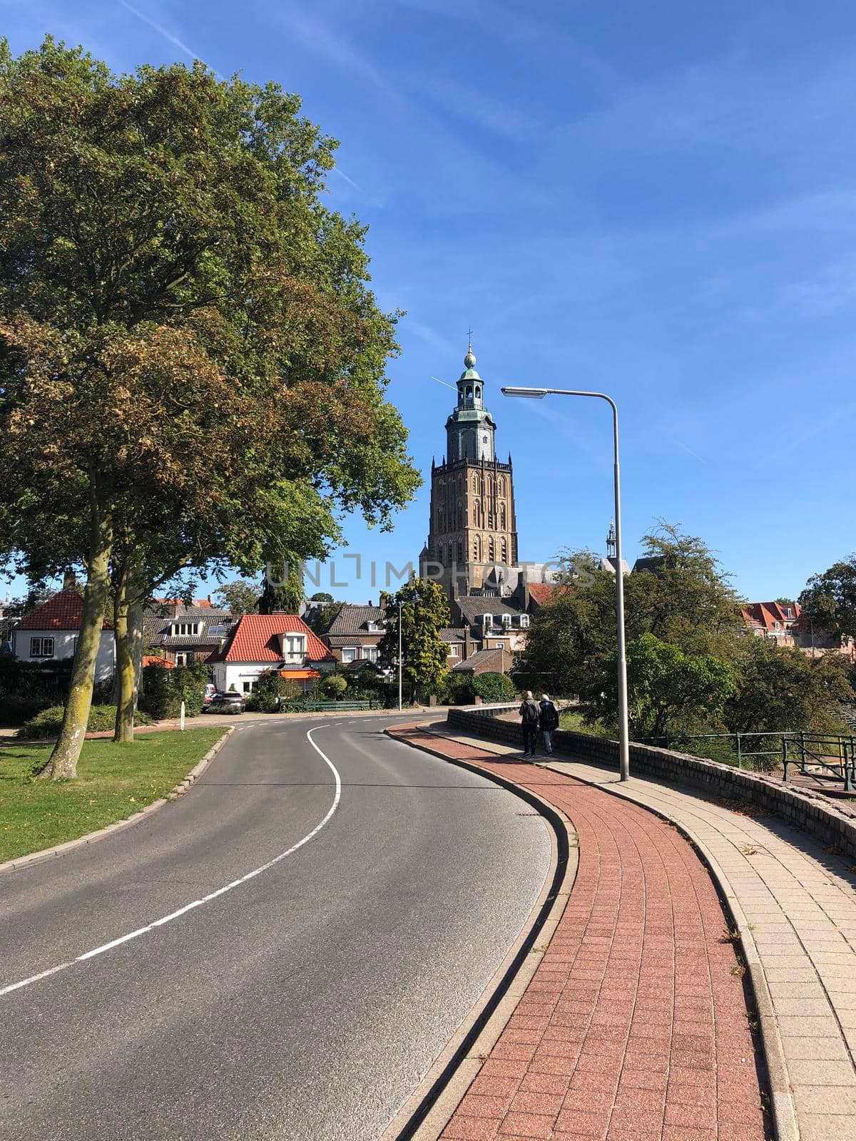 Tourists walking towards the St. Walburgis Church in Zutphen, Gelderland The Netherlands