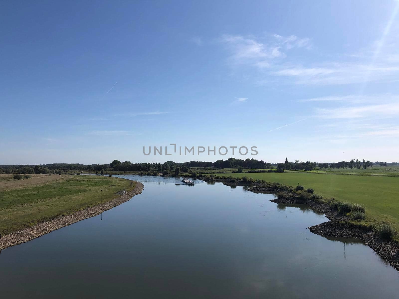 Cargo ship at the IJssel river around Zutphen, Gelderland The Netherlands