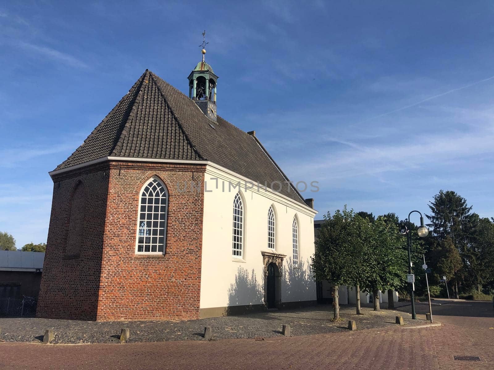 Church in Lobith by traveltelly