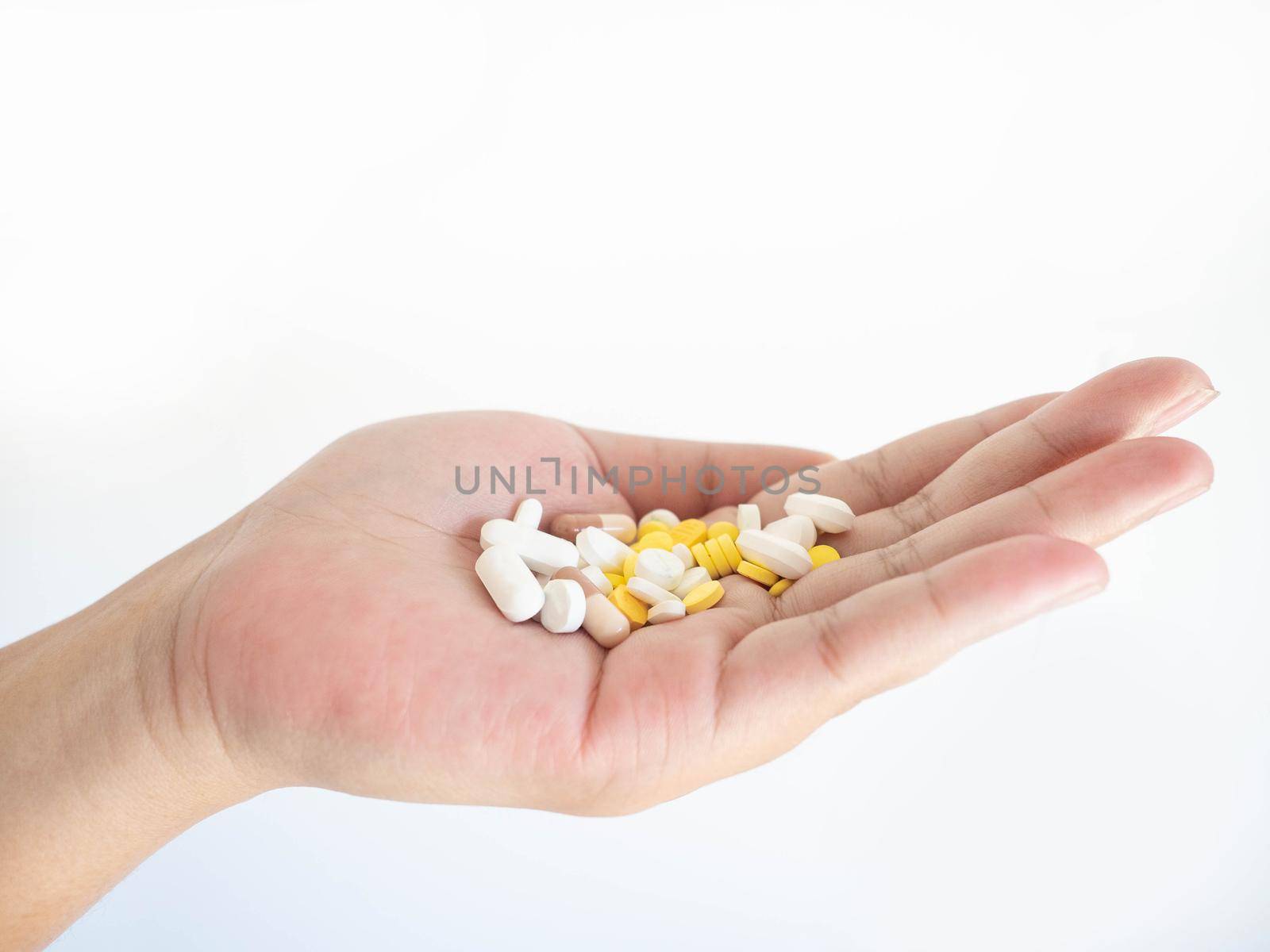 A woman with a medicine on one hand On a white background