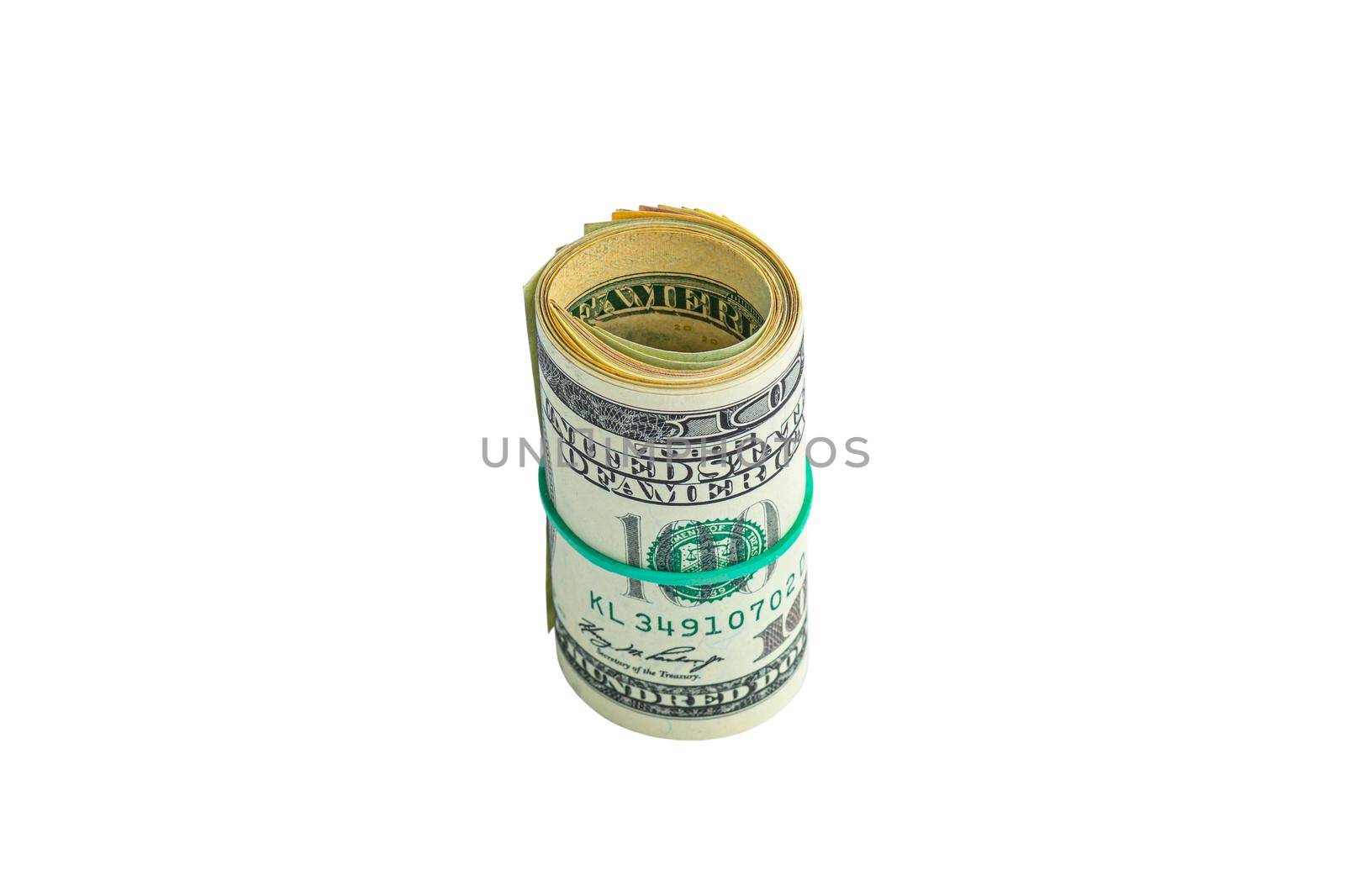 Money in a roll tied with an elastic band. The isolated object on a white background. Close up photo of money. U.S. dollars. Banknotes. Paper money isolated on white background.