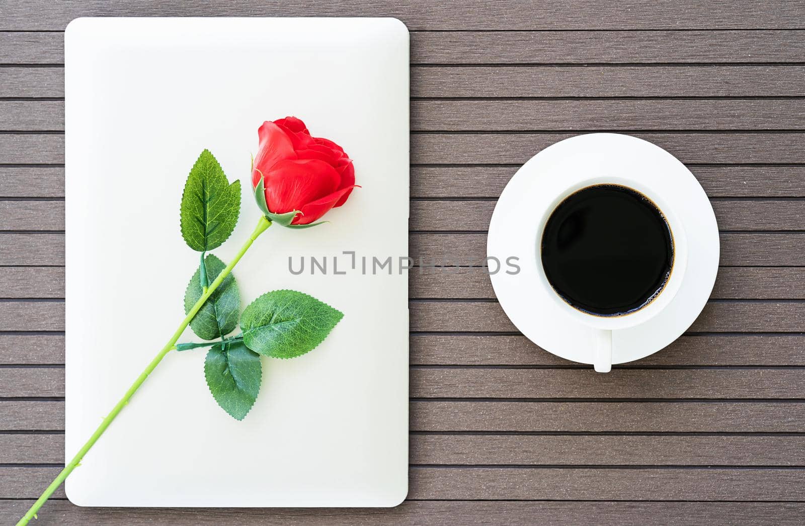 Coffee time with laptop,coffee cup,red rose by stoonn