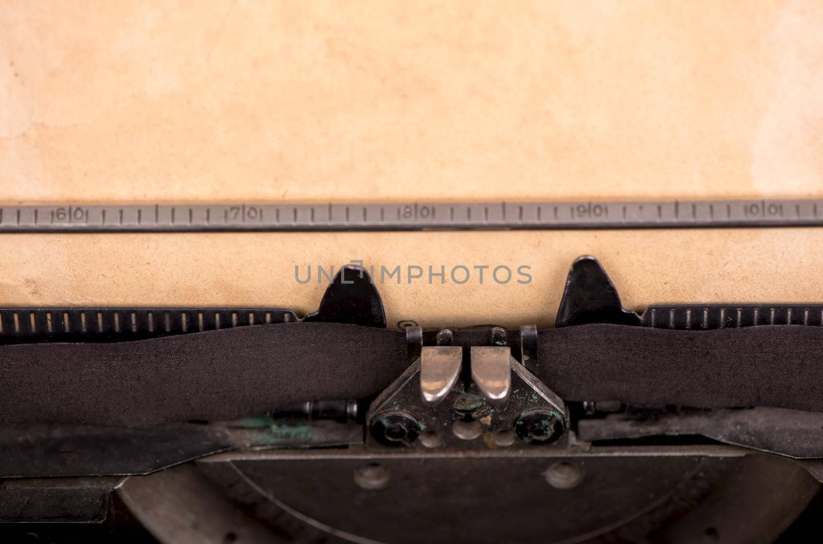 close up image of typewriter with paper sheet. copy space for your text. retro filtered by aprilphoto
