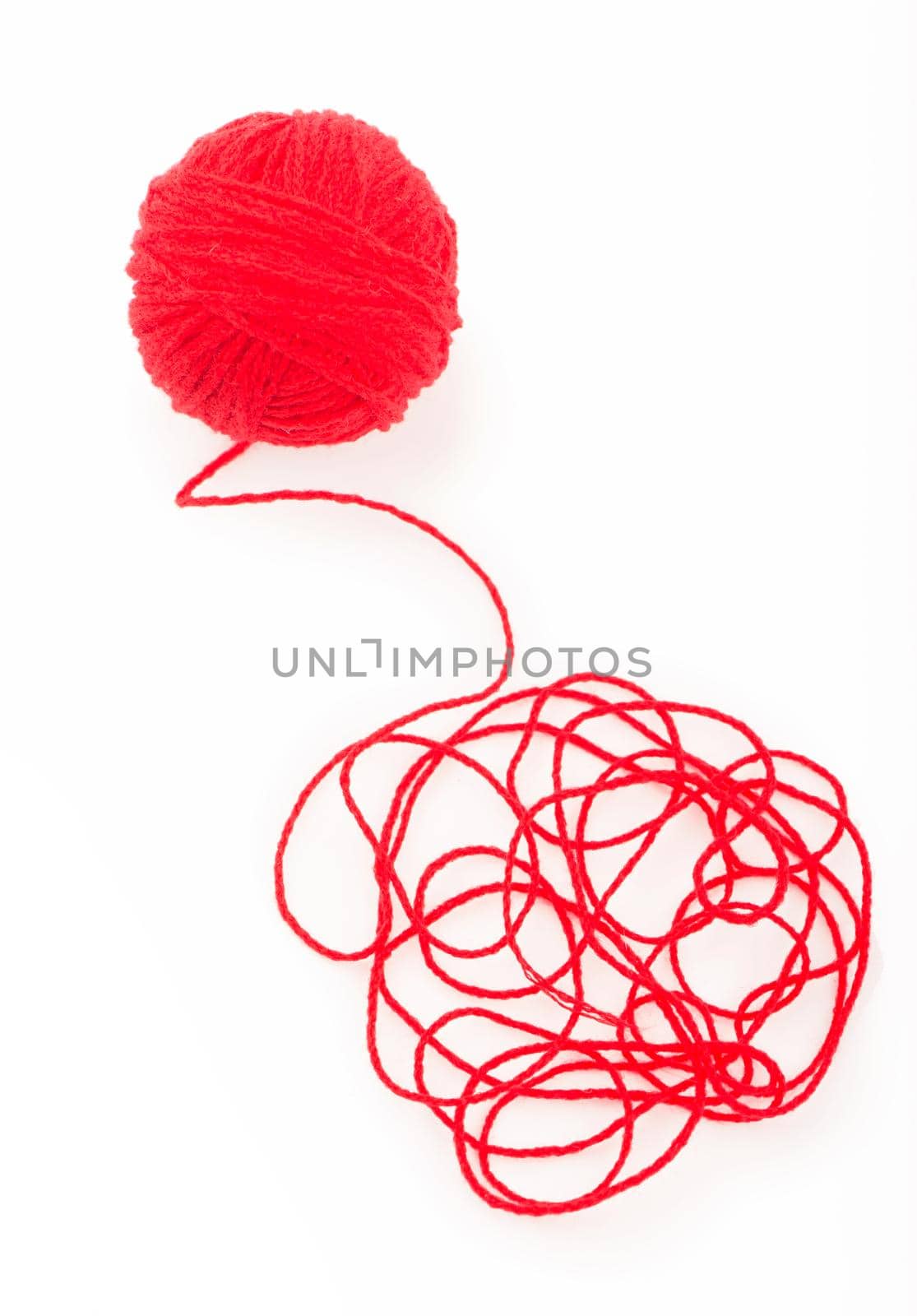 Ball of yarn on the white background by aprilphoto