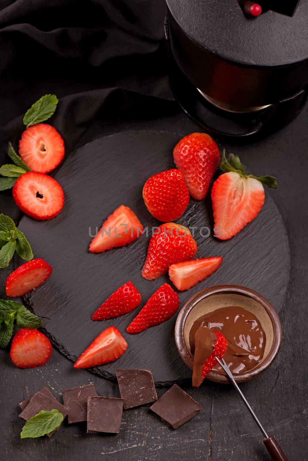 Flat lay composition with chocolate covered strawberries on grey background by aprilphoto