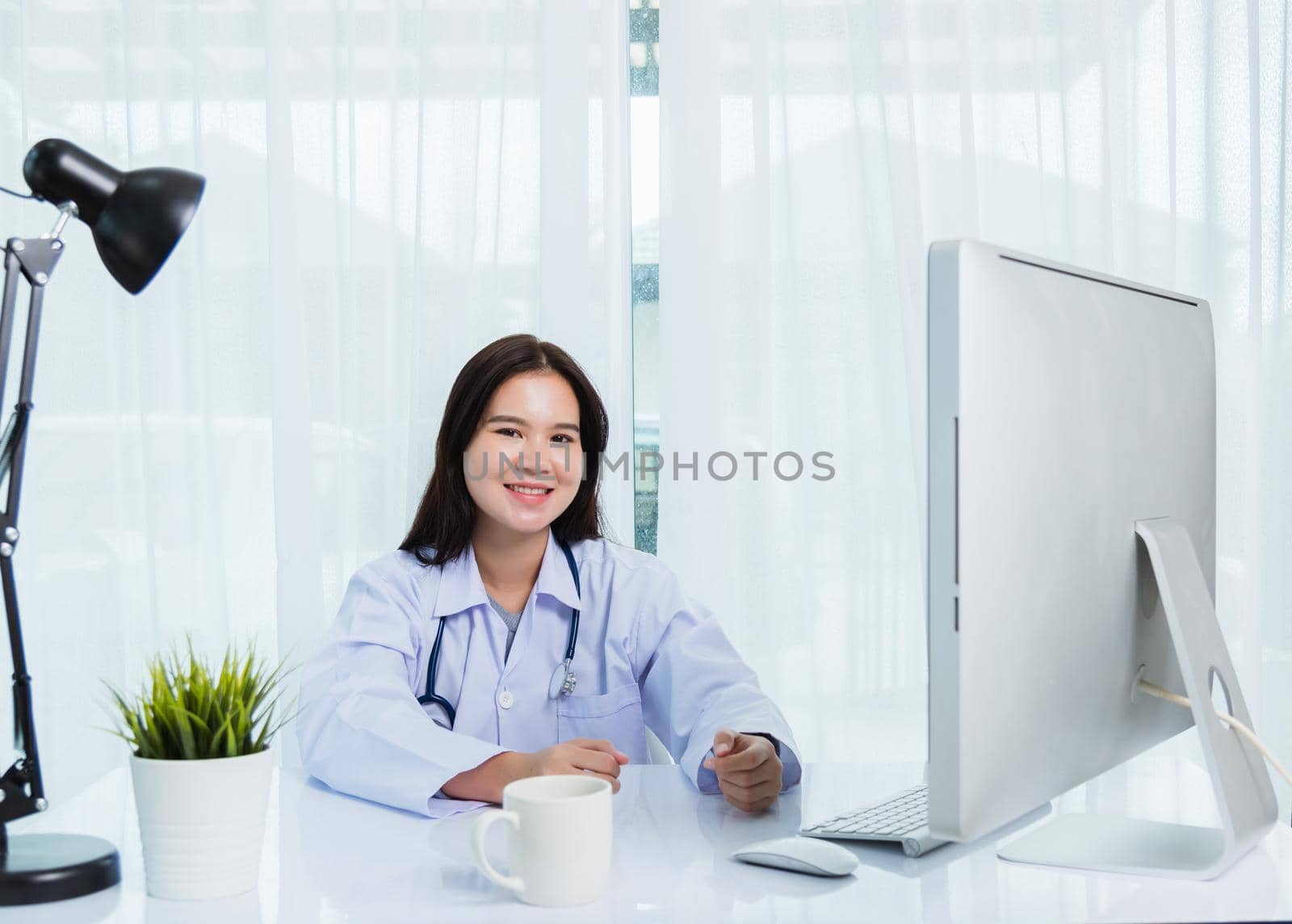Woman doctor video call conference online sit listen patient to explain by Sorapop
