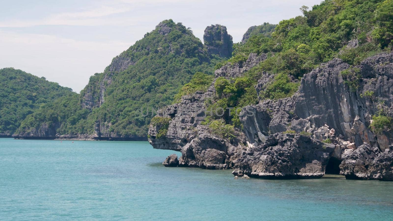 Group of Islands in ocean at Ang Thong National Marine Park near touristic Samui paradise tropical resort. Archipelago in the Gulf of Thailand. Idyllic turquoise sea natural background, copy space