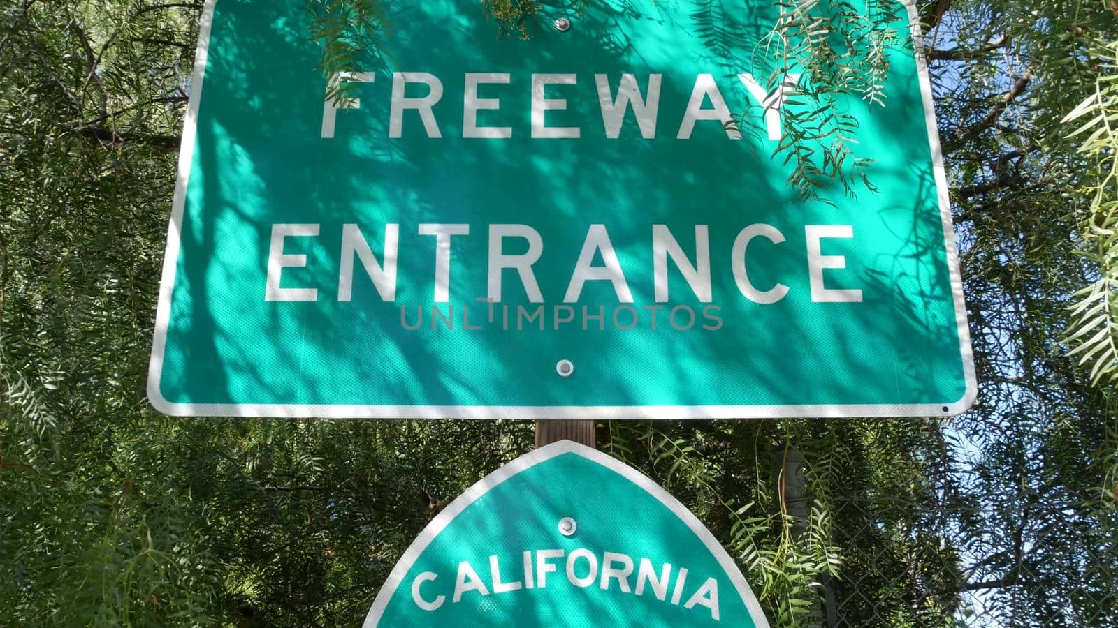 Freeway entrance sign on interchange crossraod in San Diego county, California USA. State Route highway 78 signpost plate. Symbol of road trip, transportation and traffic safety rules and regulations.