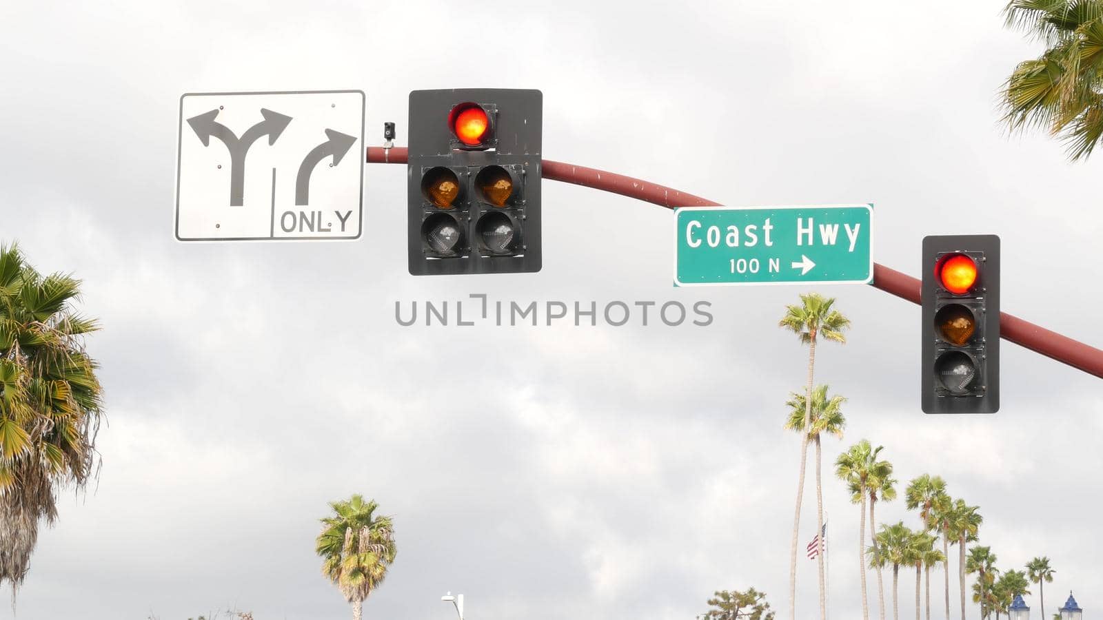 Pacific Coast Highway, historic route 101 road sign, tourist destination in California USA. Lettering on intersection signpost. Symbol of summertime travel along the ocean. All-American scenic hwy by DogoraSun