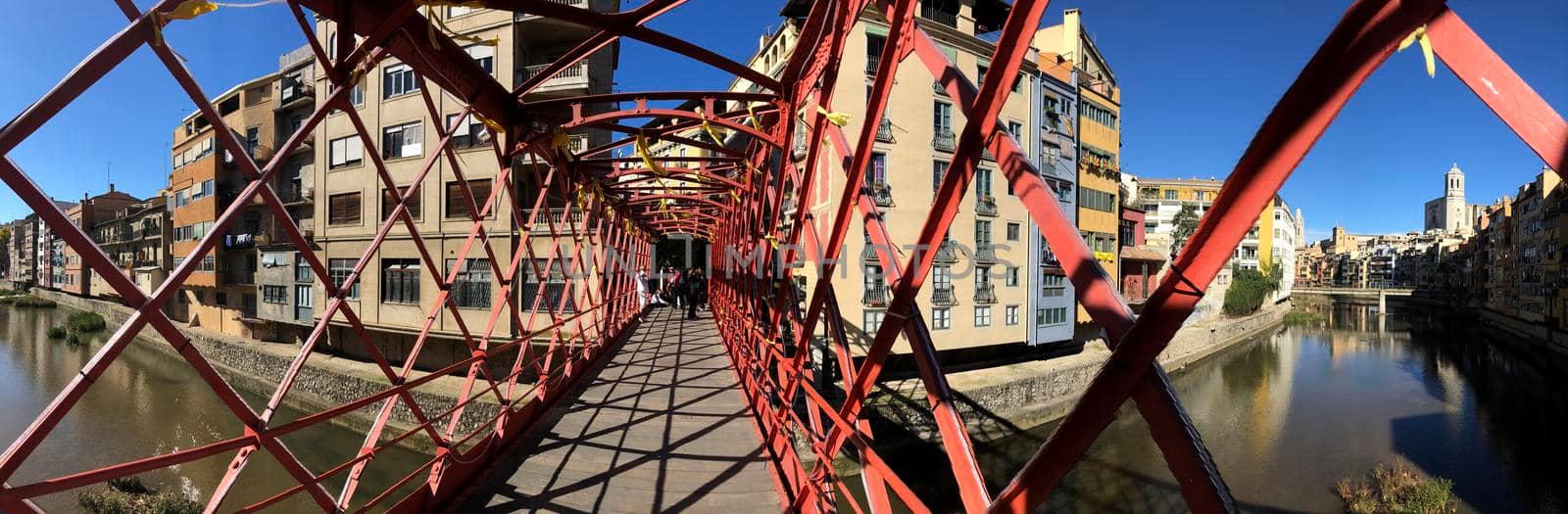 Panorama from the Pont de les Peixateries Velles bridge over the onyar river in Girona, Spain