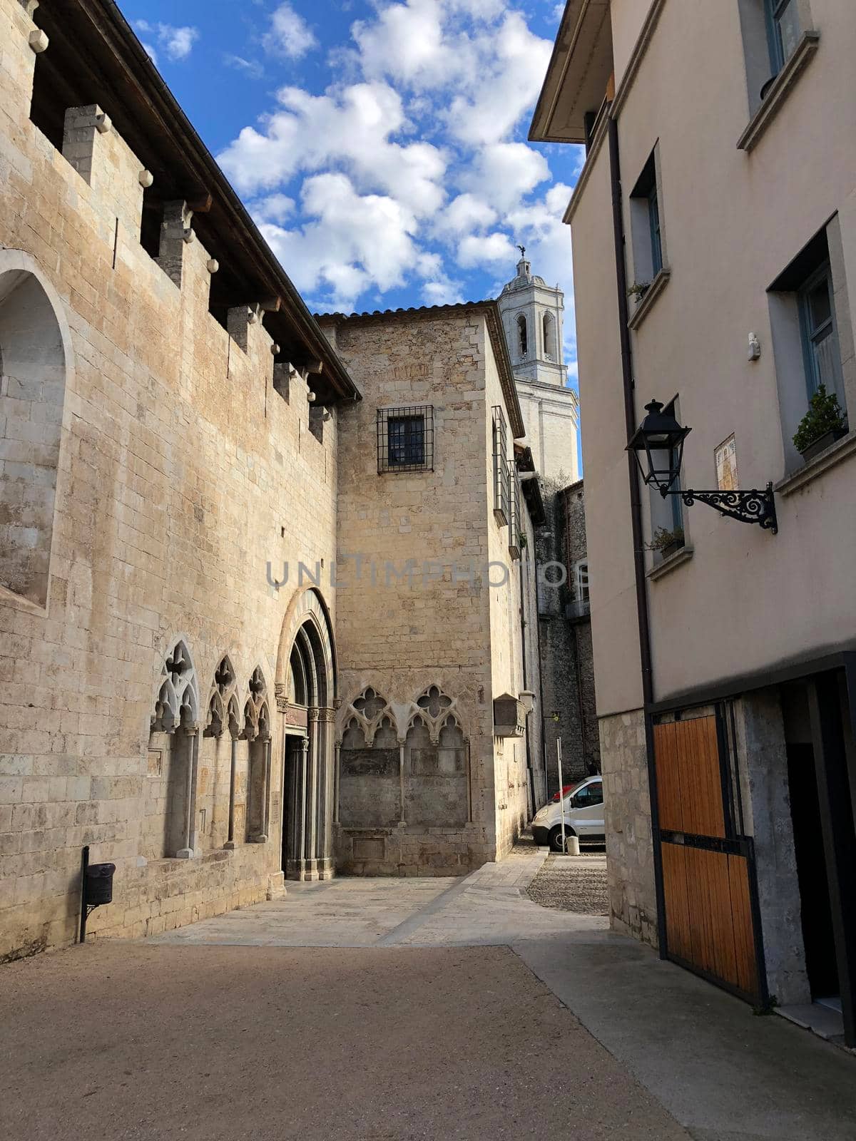 Street next to the Basilica de Sant Feliu in Girona Spain