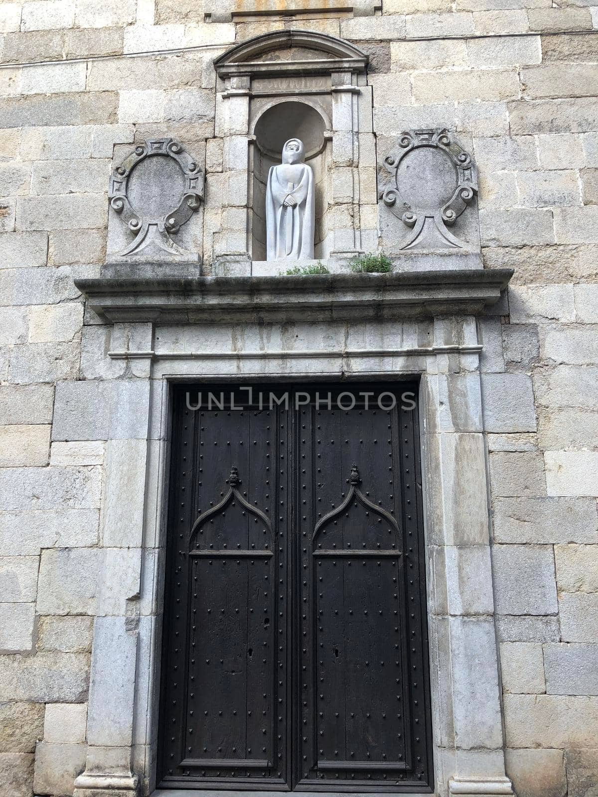 Door from the Basilica de Sant Feliu in Girona Spain