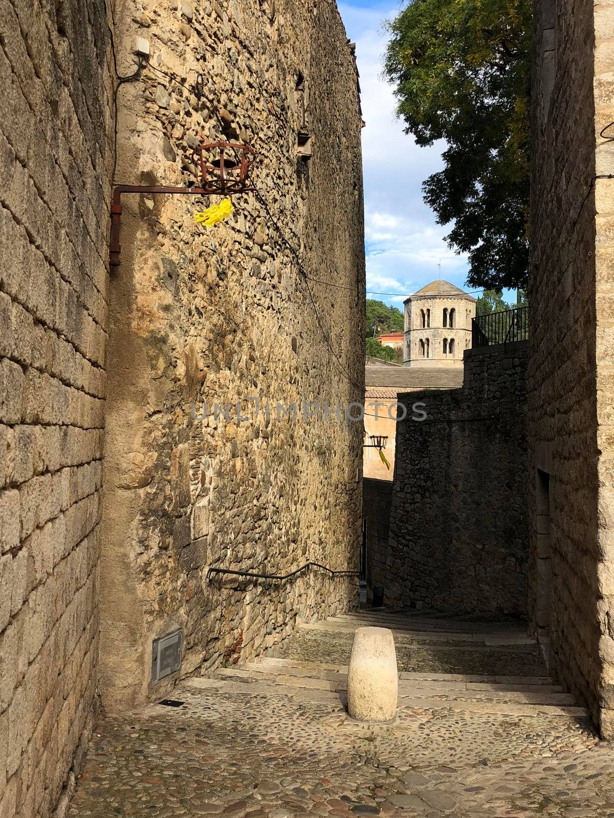 Alley towards Sant Pere de Galligants Monastery in Girona, Spain