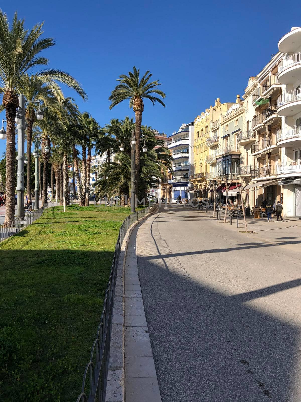 Boulevard in Sitges by traveltelly