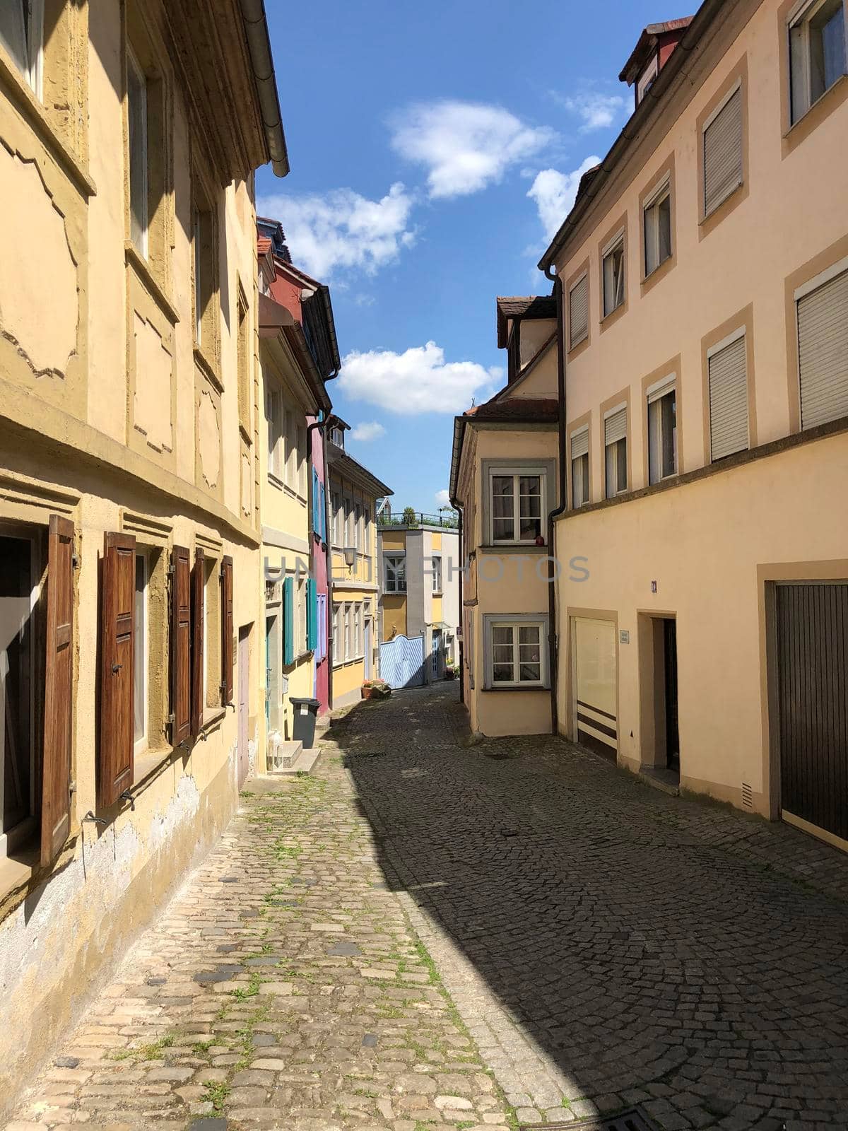 Street in the old town of Bamberg by traveltelly