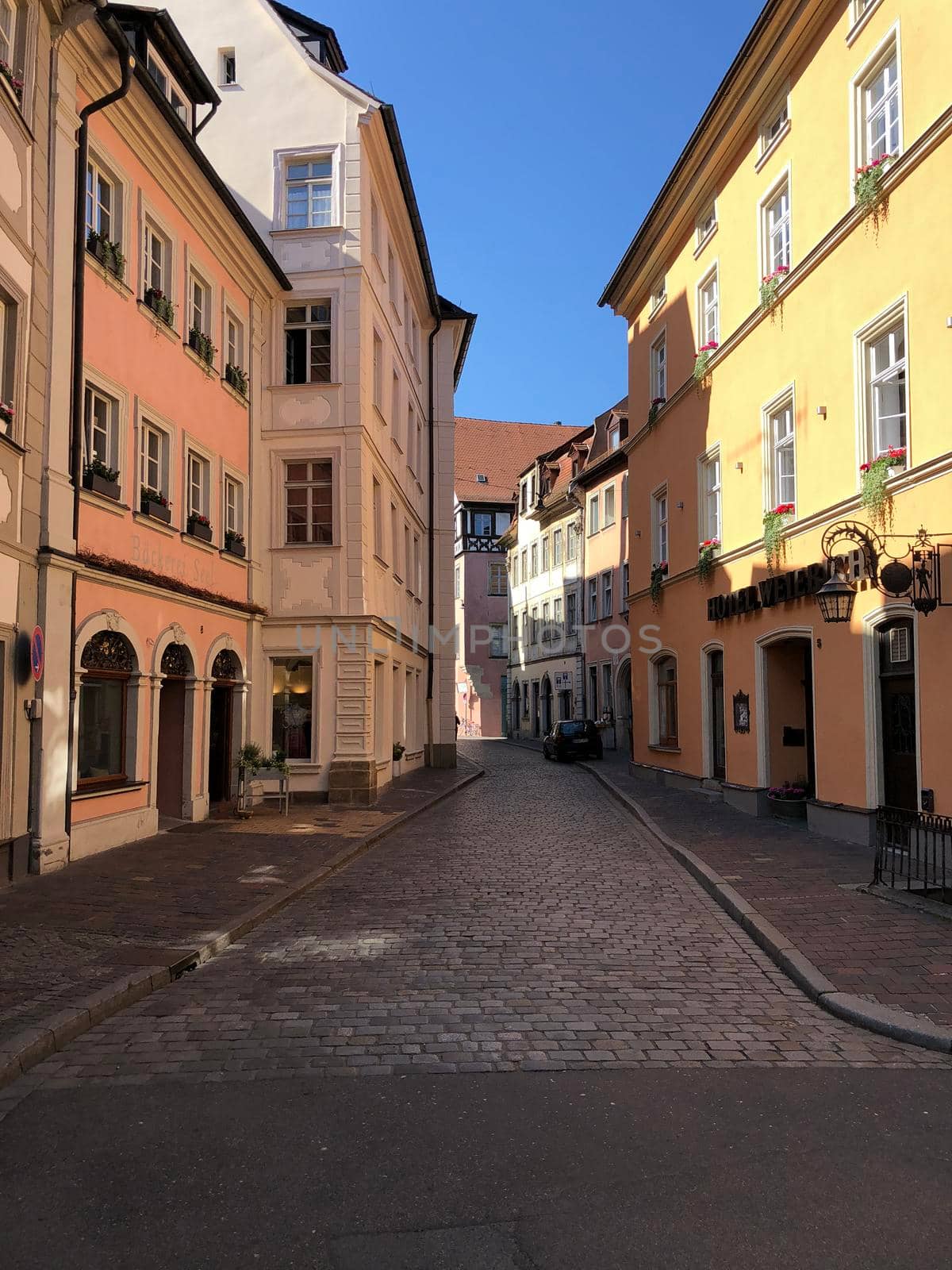 Street in the old town of Bamberg  by traveltelly