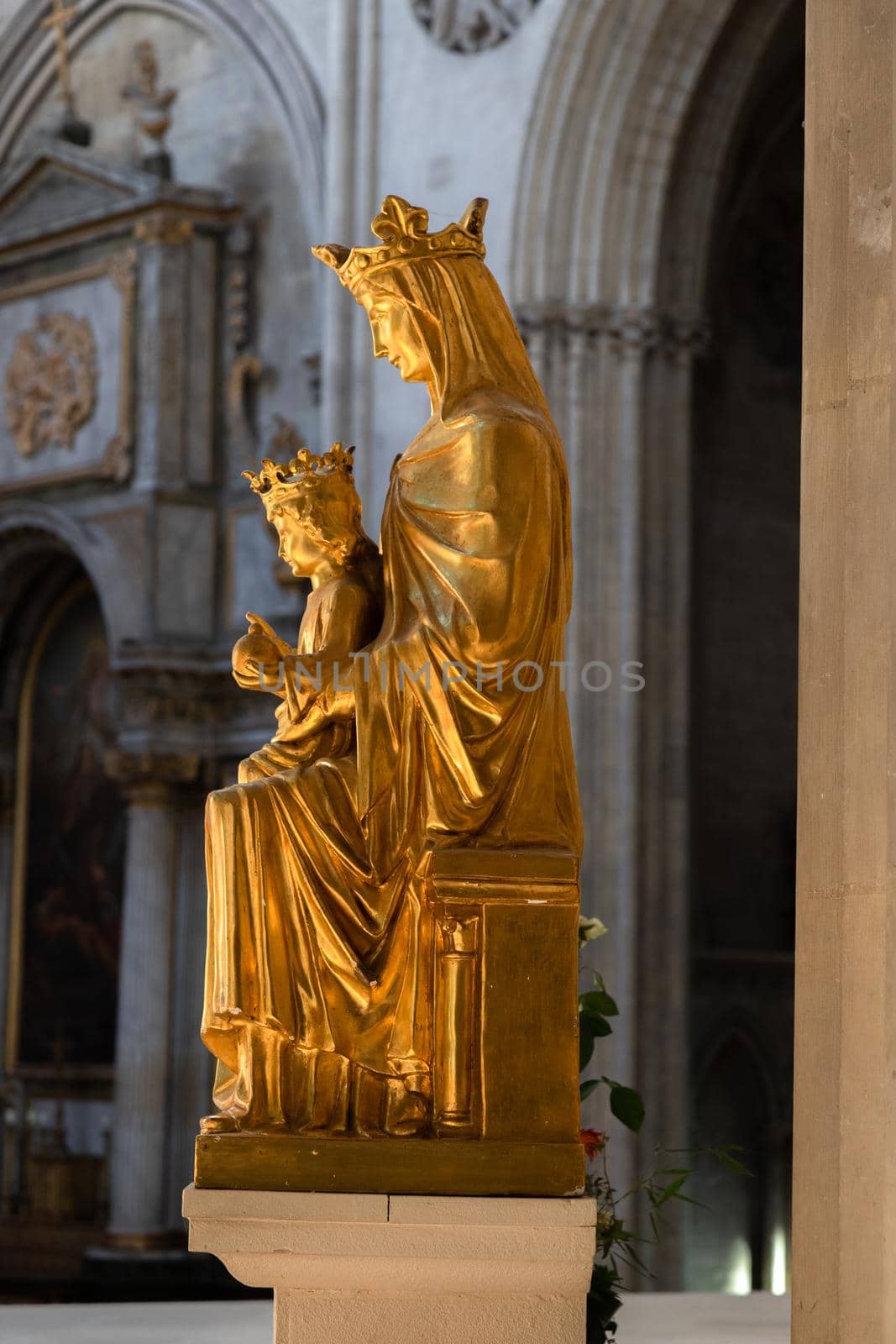 Rouen Cathedral Normandy France 9.25.2019 one of the greatest examples of the high gothic church from 13th cent. Beautiful gold statue of Mary and Jesus High quality photo