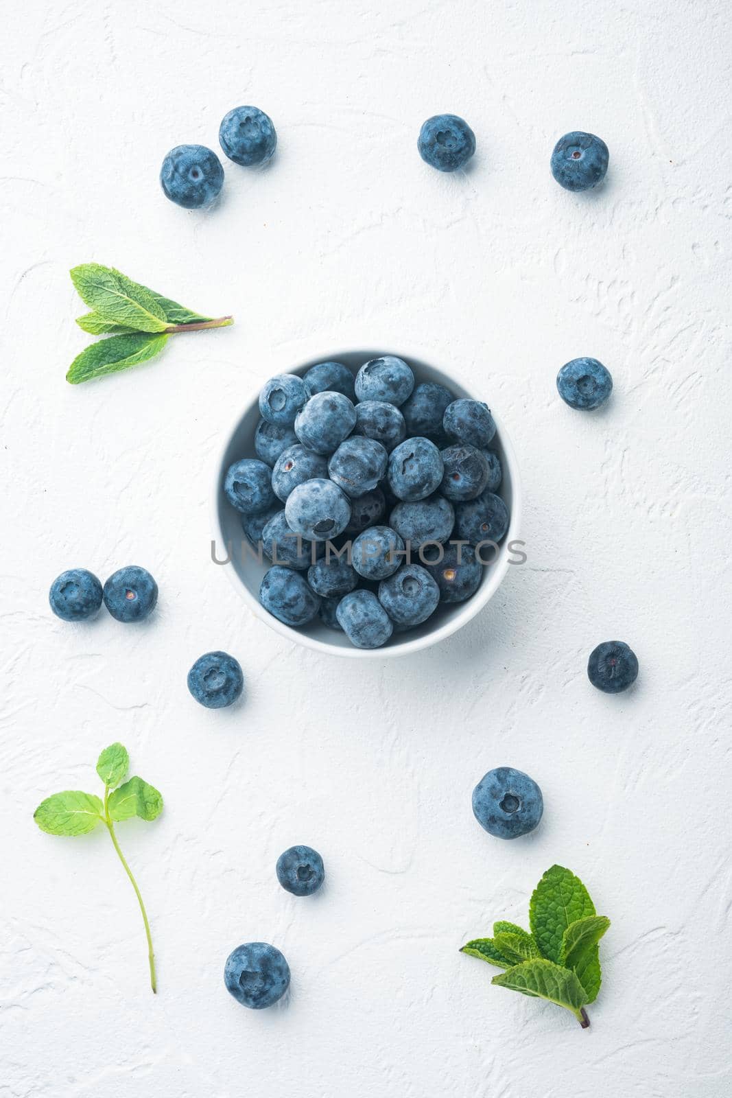 Ripe Strawberries and Blueberrie, on white background, top view flat lay