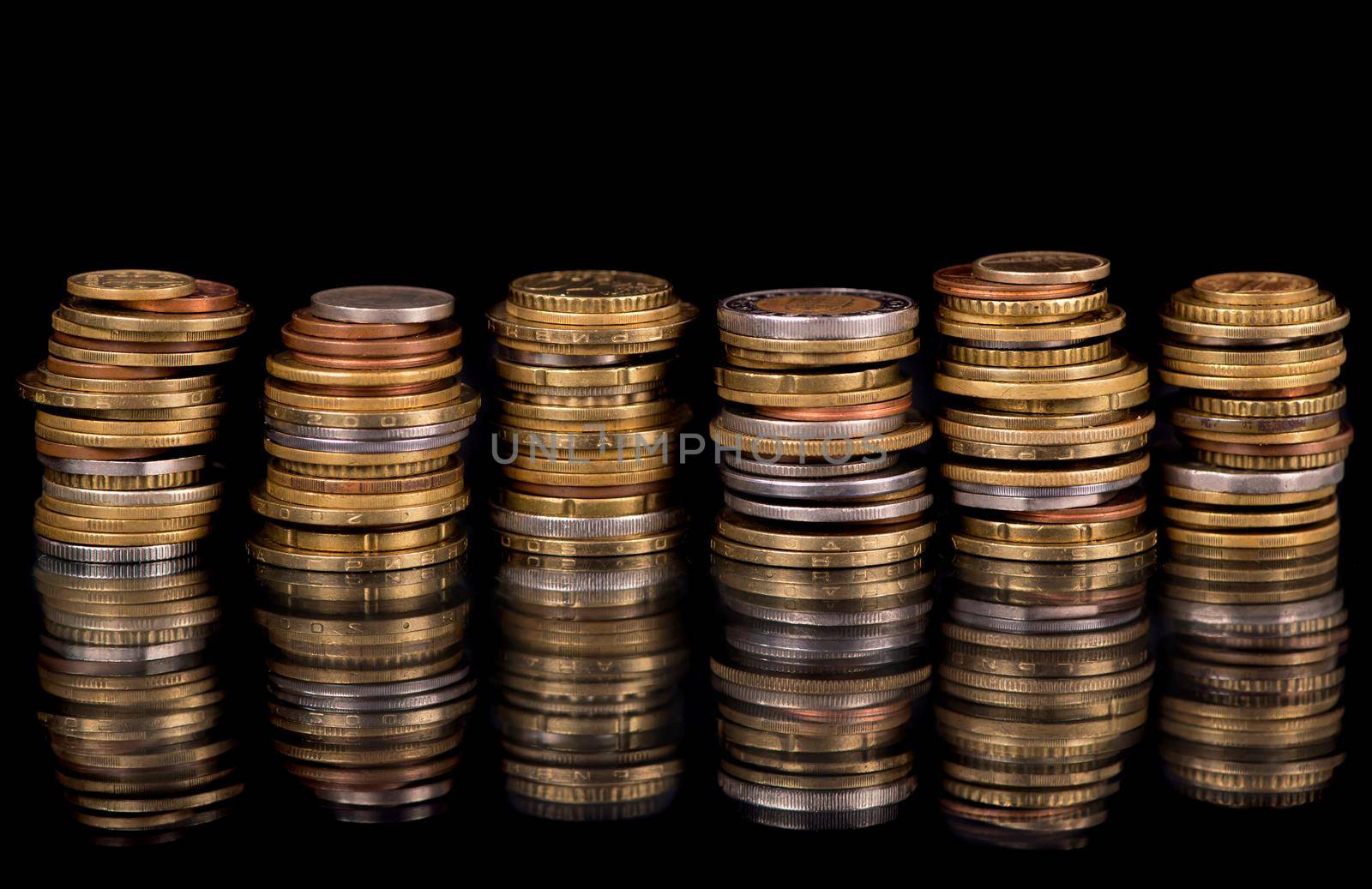 Composition of the coins on the black background