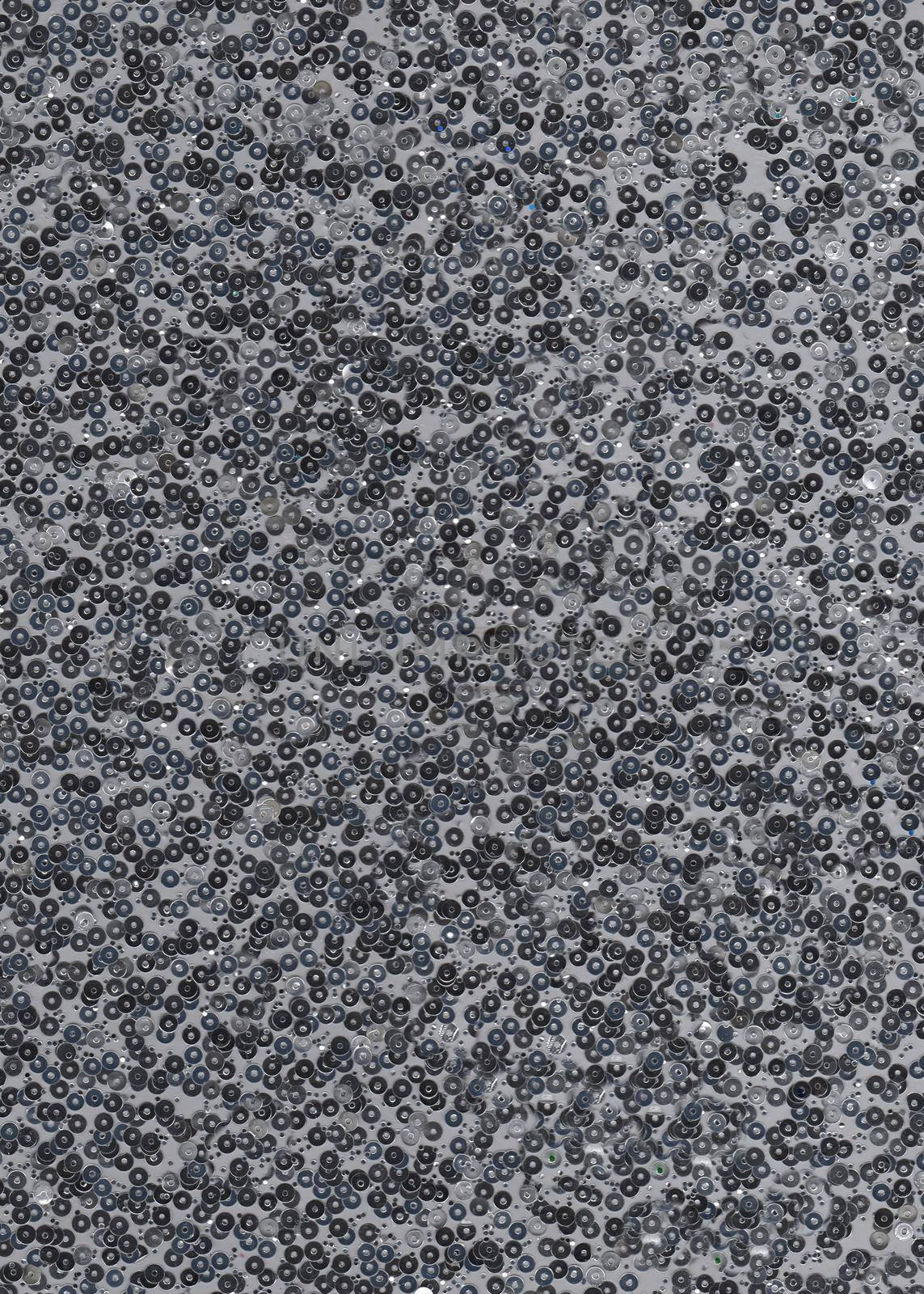 A large number of decorative round sequins for interior and fashion design works.Texture or background