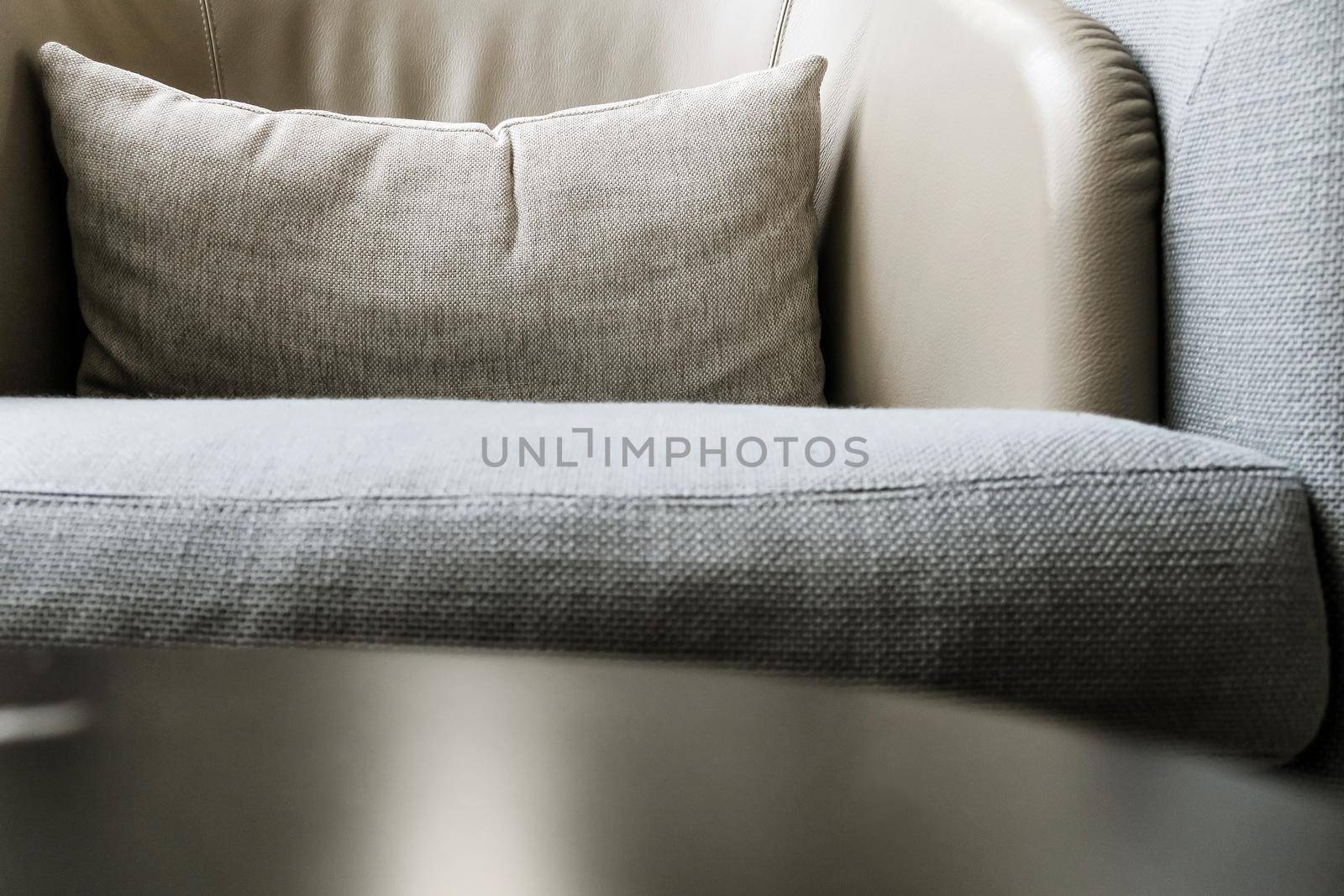 Detail image of cushion on sofa, modern living room.