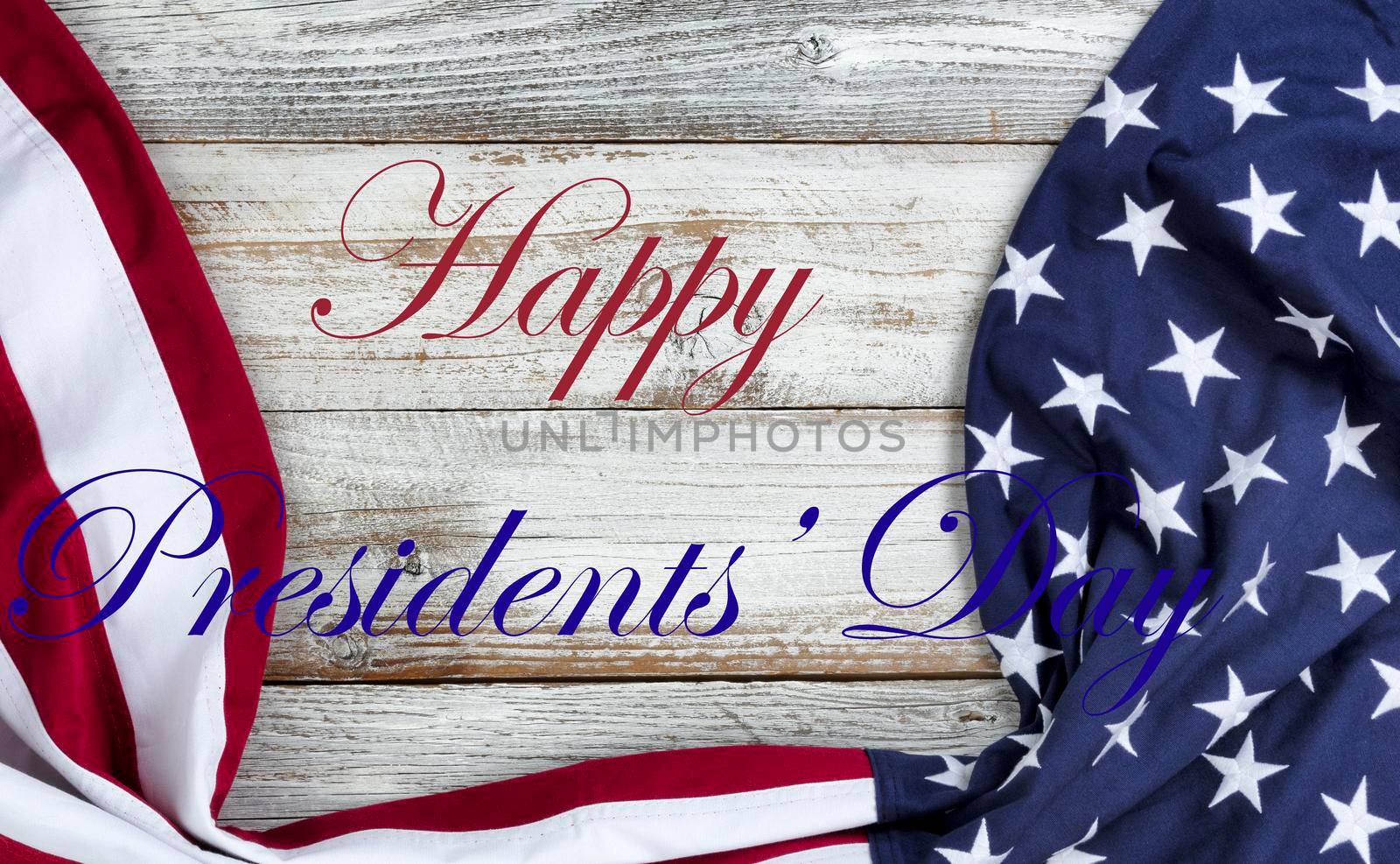 Happy Presidents Day text with draped US flag on bottom of white rustic wood          by tab1962