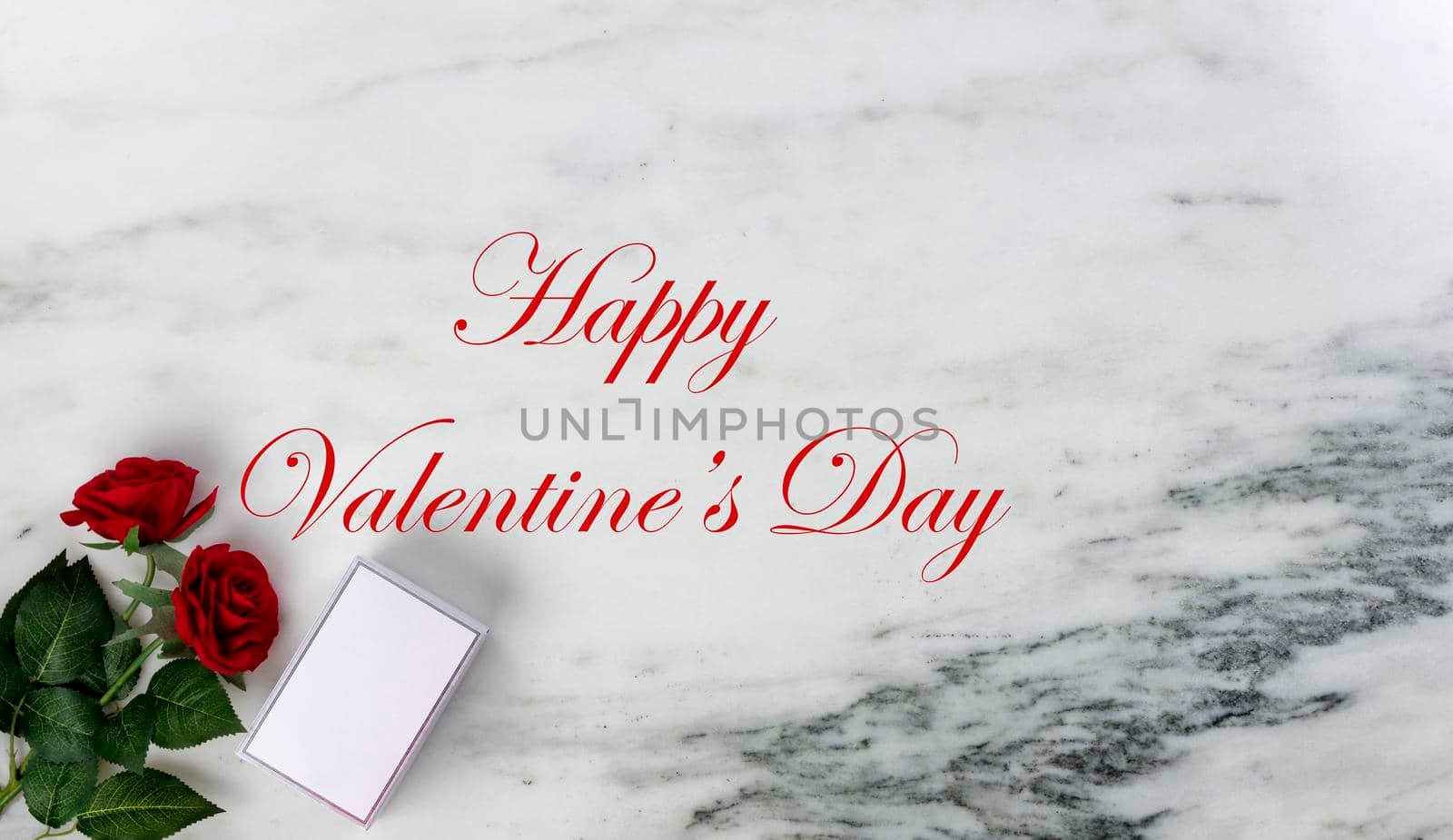 Happy Valentines Day with lovely red rose flowers and gift on natural marble stone plus text message by tab1962