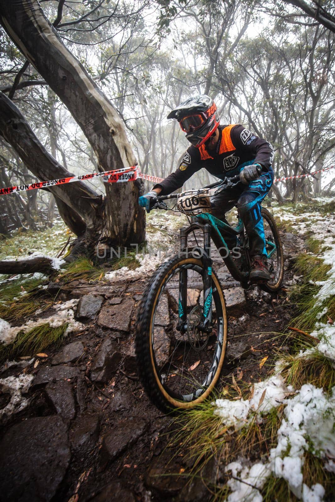 Mt Buller, Australia - January 16 2021: Practice round for the Victorian Downhill Mountain Bike Series after a summer snow storm