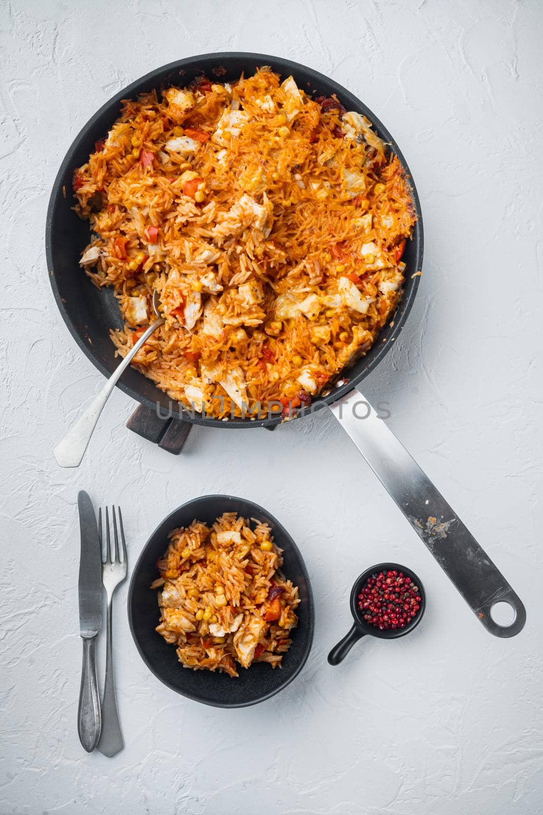 Chicken Enchiladas, Served In Casserole, on white background, top view flat lay