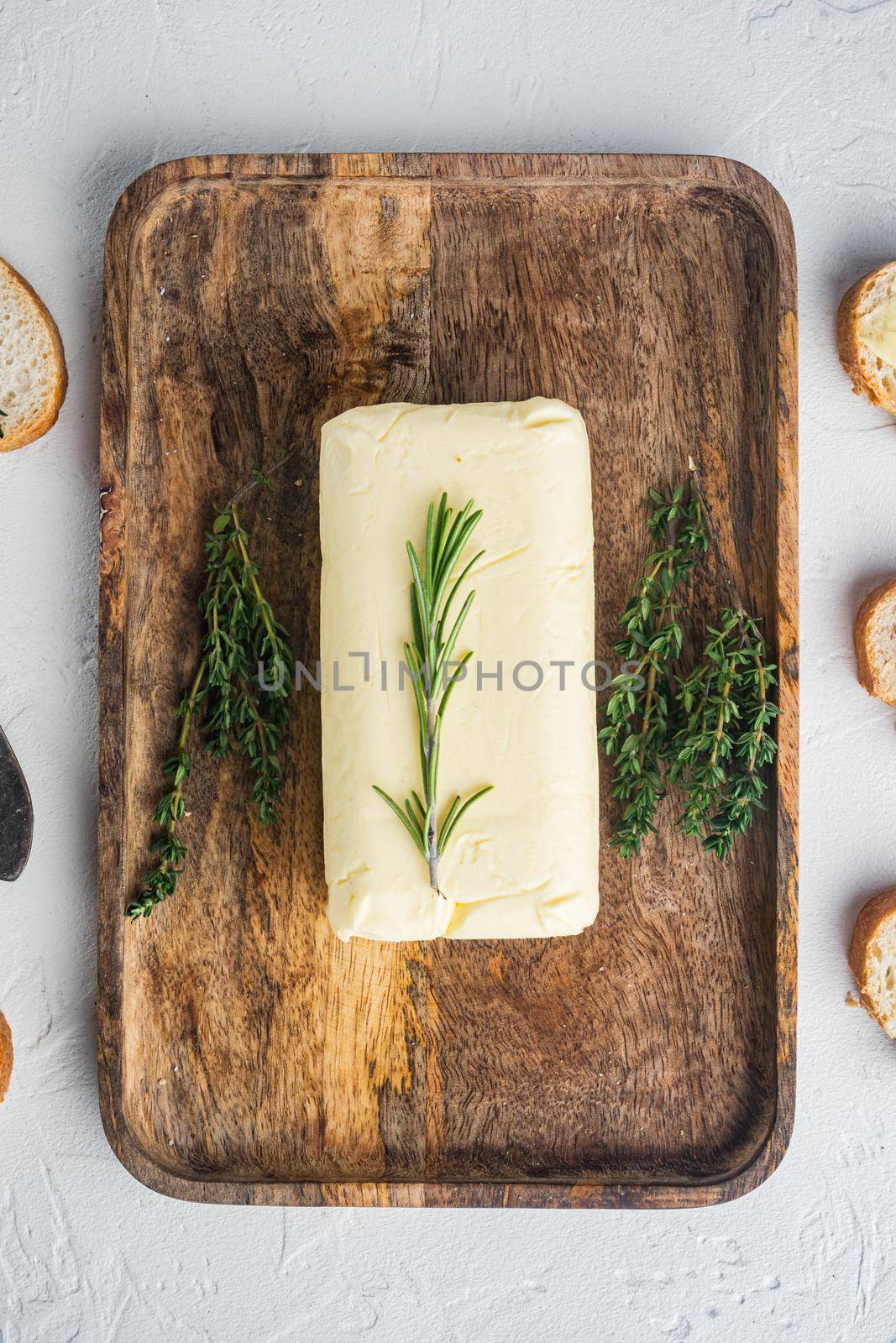 Fresh butter package, on white background, top view flat lay
