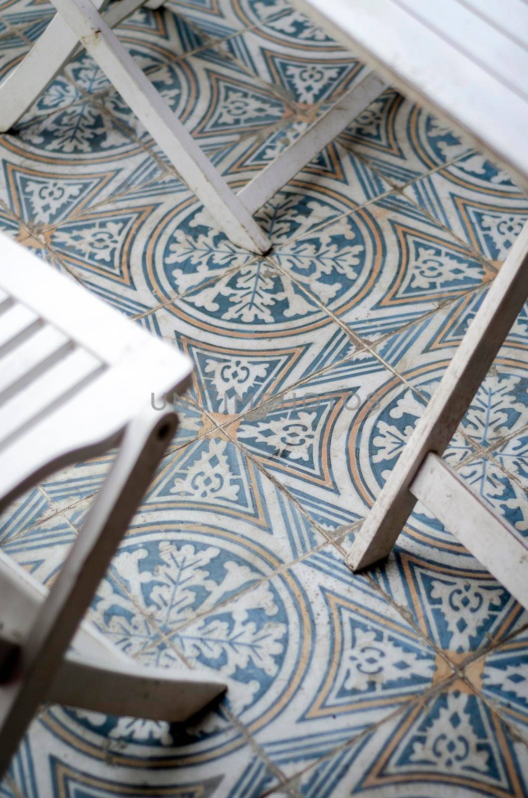 traditional design old rustic floor tiles detail in seville andalucia cafe