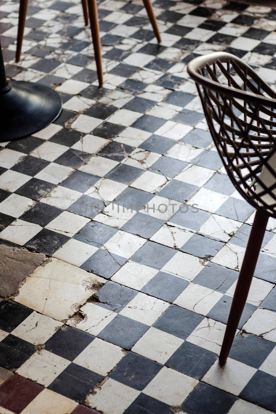 traditional design old rustic floor tiles detail in trendy Ibiza cafe