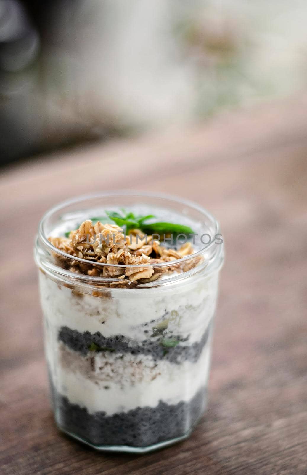 homemade healthy rustic yoghurt and granola with basil seeds breakfast snack cup