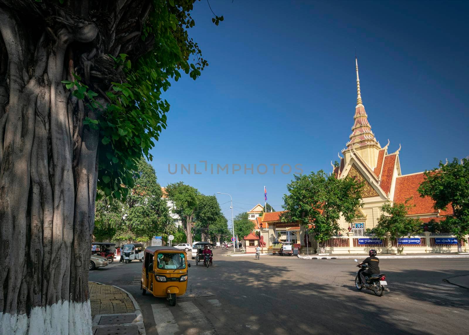 courthouse and street view of downtown phnom penh city cambodia next to Royal Palace on sunny day