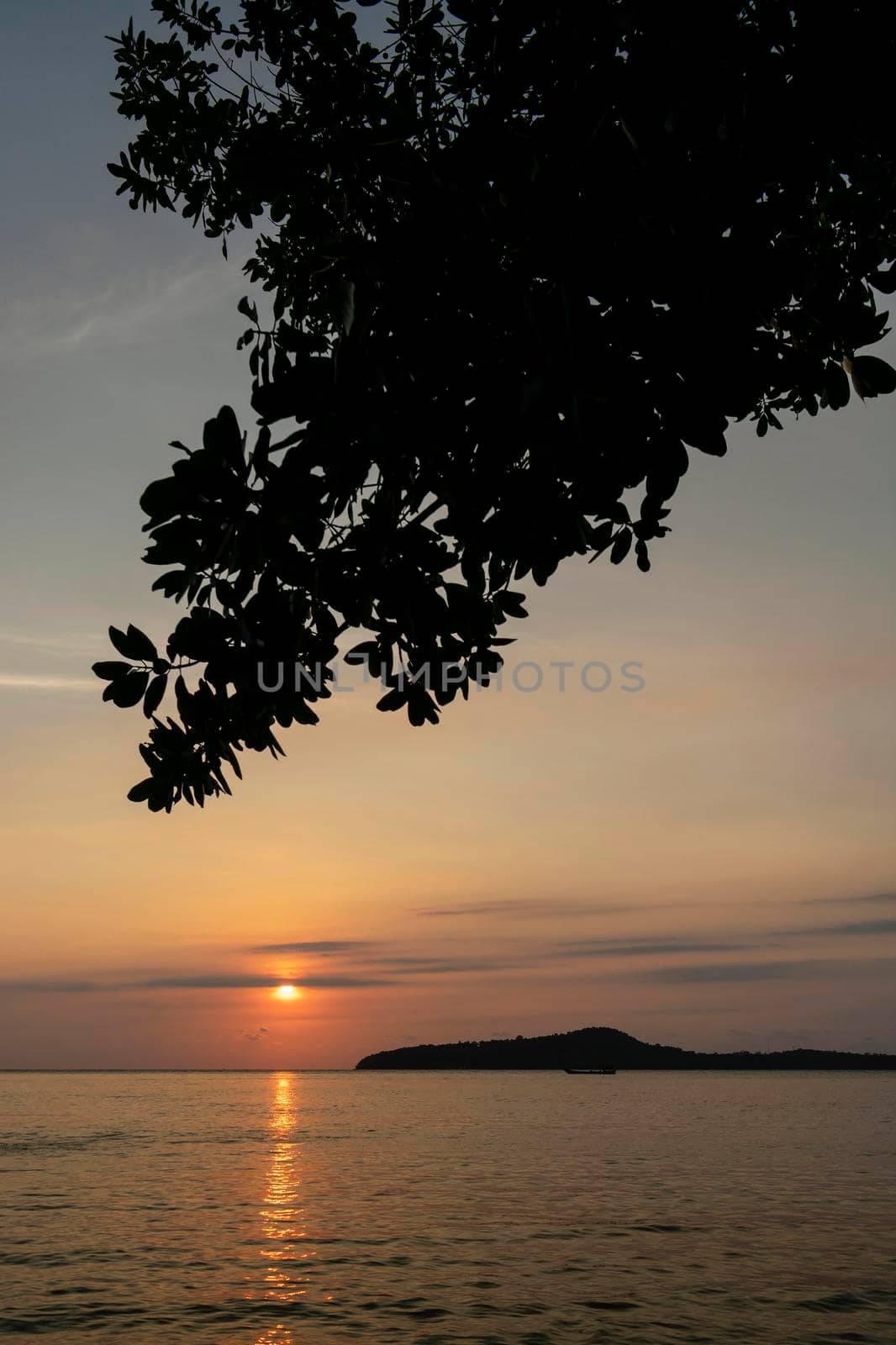 view from Koh Ta Kiev island in cambodia at sunset by jackmalipan