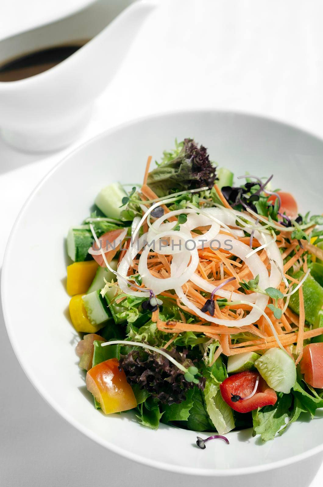 fresh organic mixed vegetable vegan Garden Salad with Vinaigrette sauce by jackmalipan