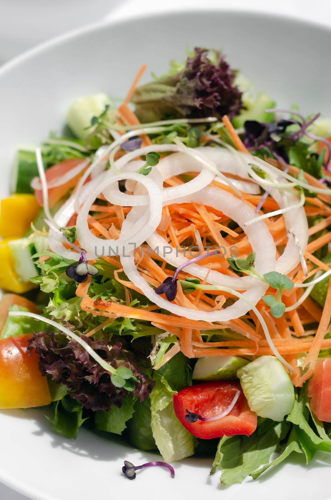 fresh organic mixed vegetable vegan Garden Salad with Vinaigrette sauce by jackmalipan